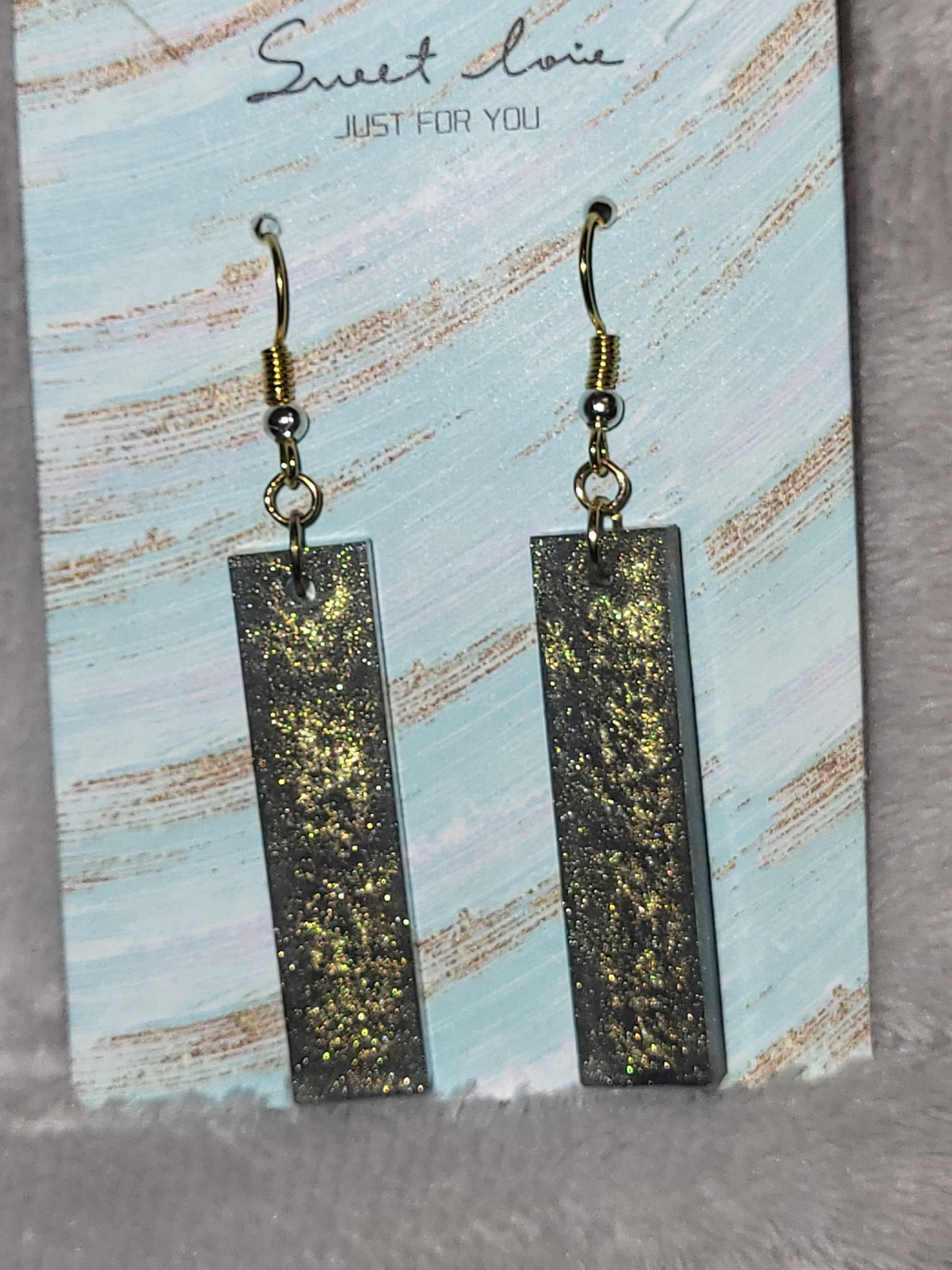 Homemade green dangling earrings