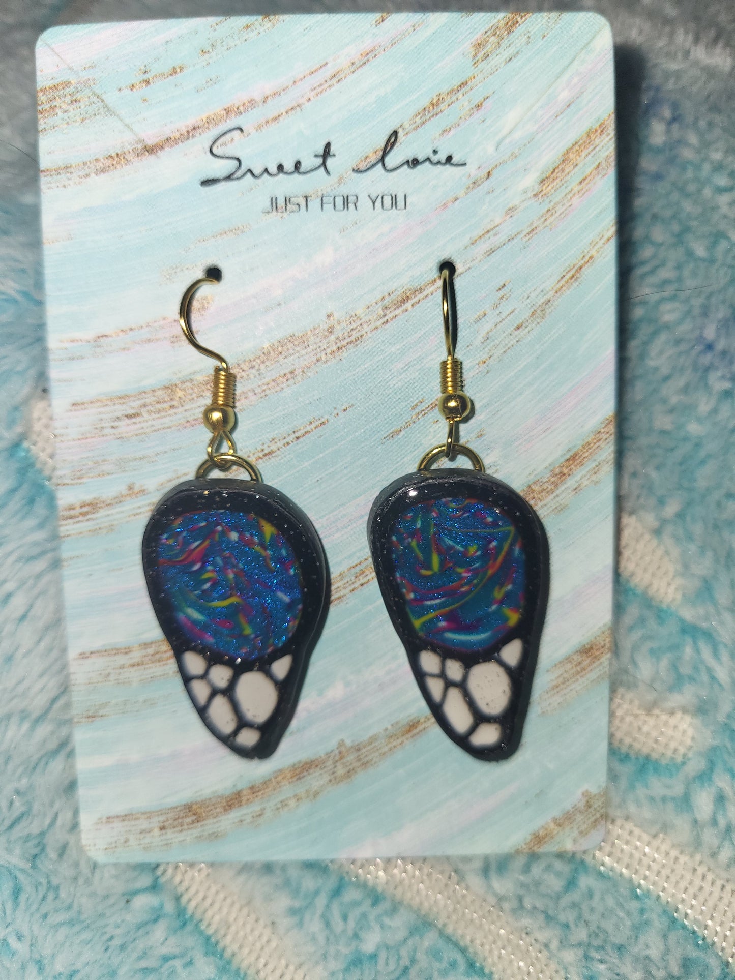 Homemade butterfly wing earrings