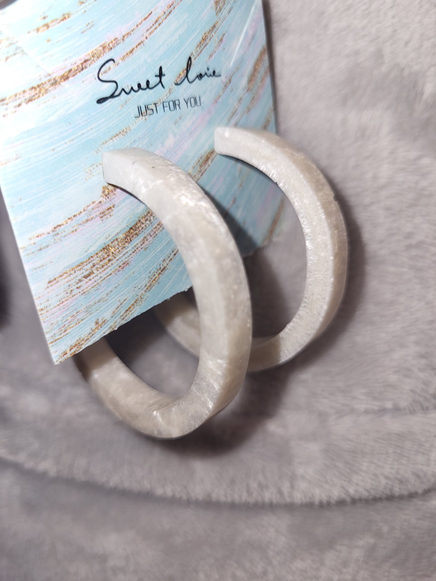 Homemade white shimmery earrings