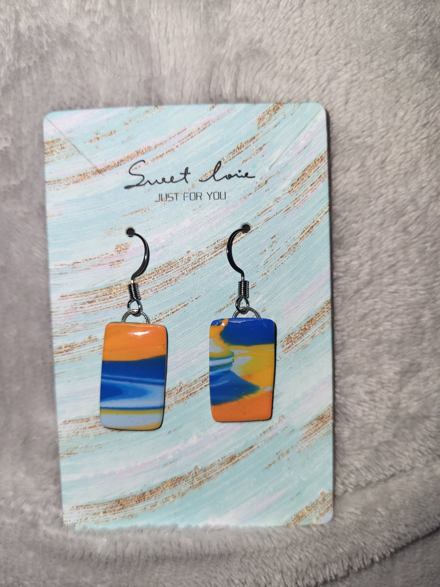 Bronco inspired marbled dangling earrings