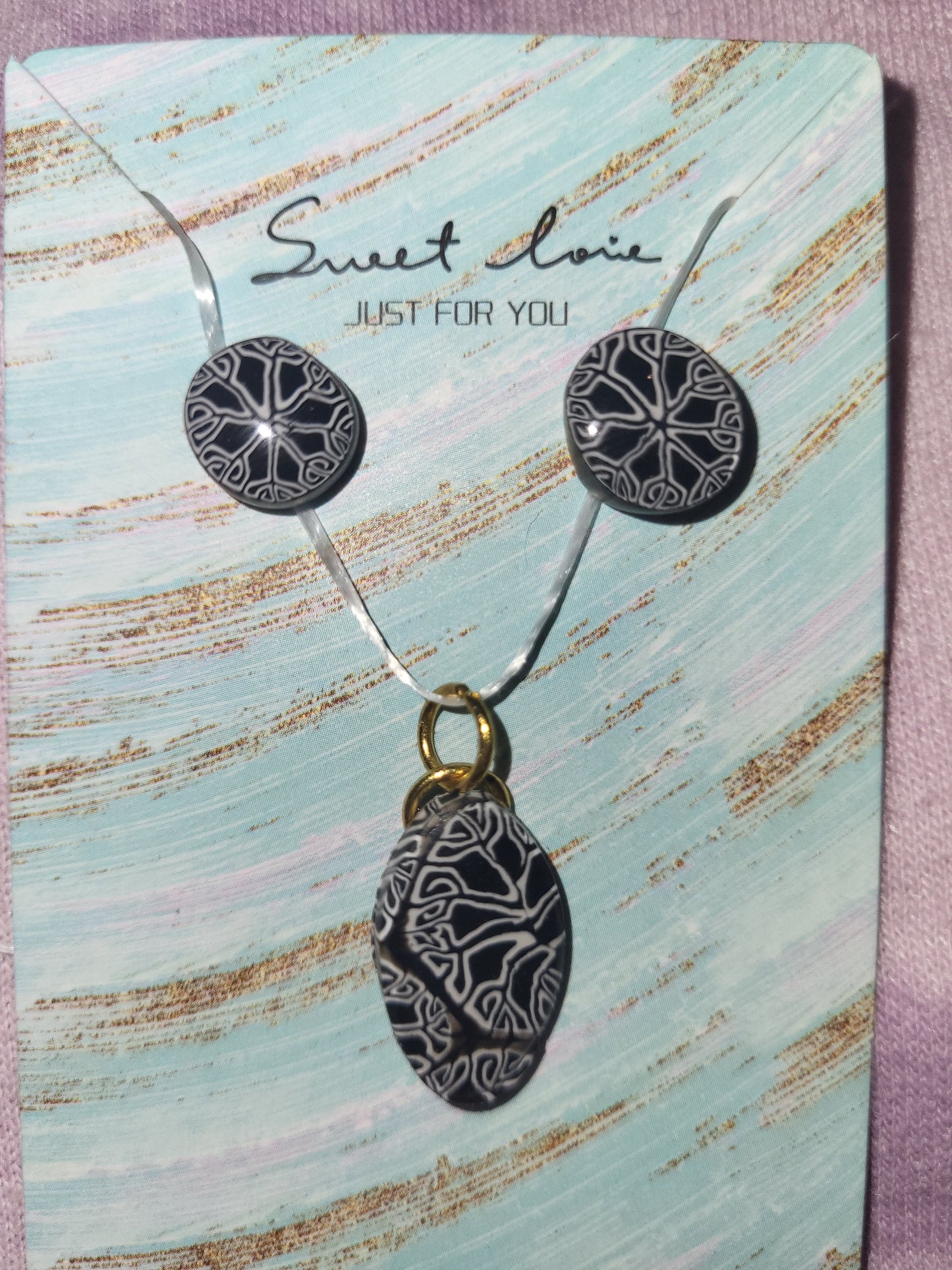 Homemade stud earrings & charm set