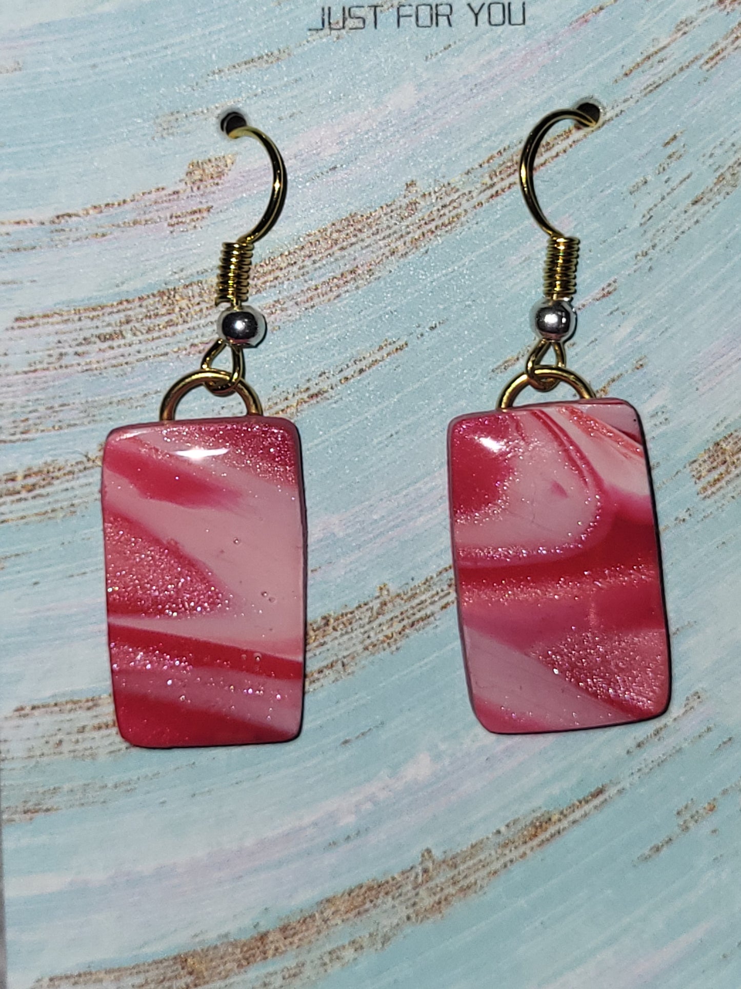 Homemade red/pink/white marbled dangling earrings