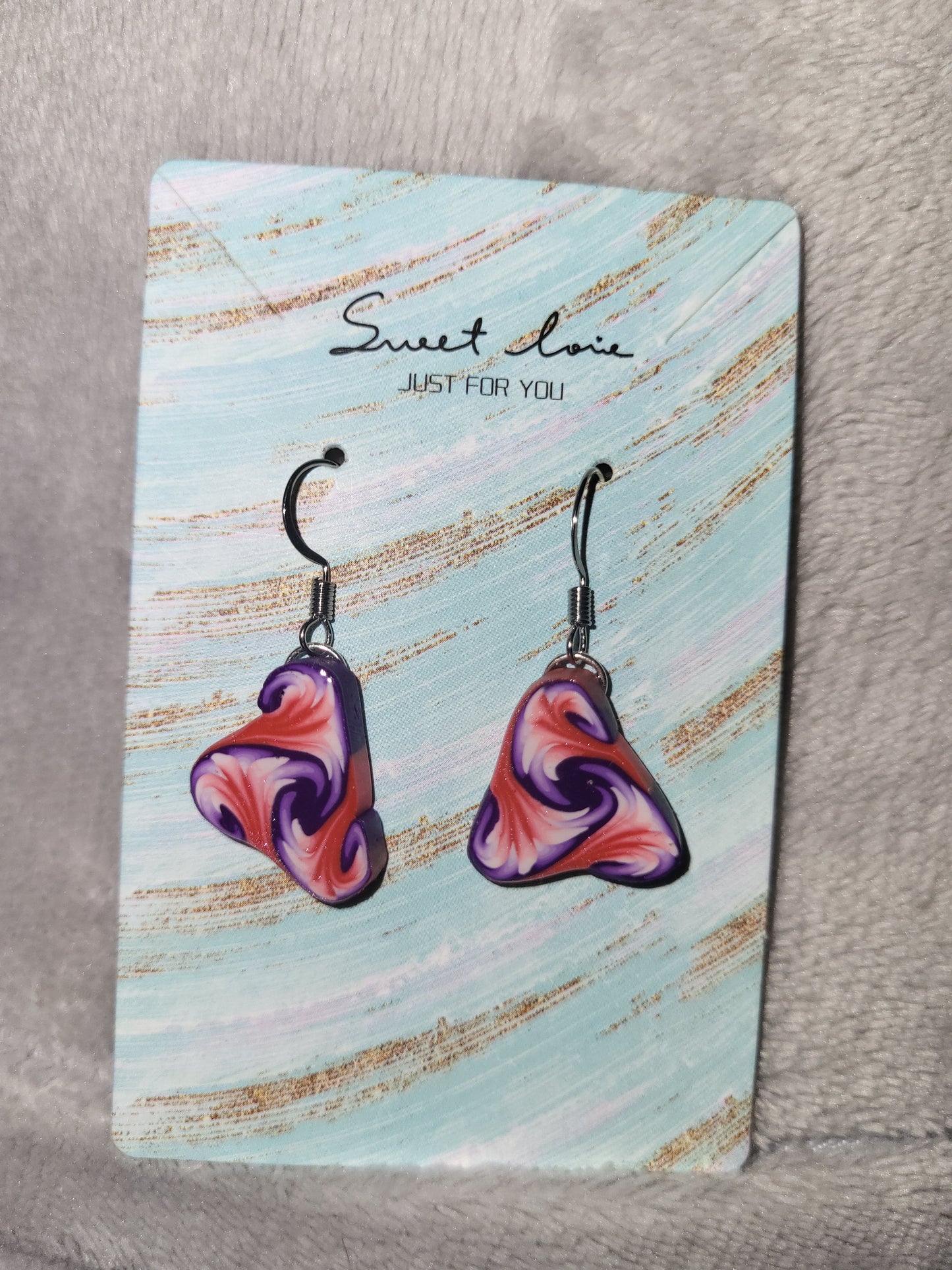 Homemade clay cane earrings