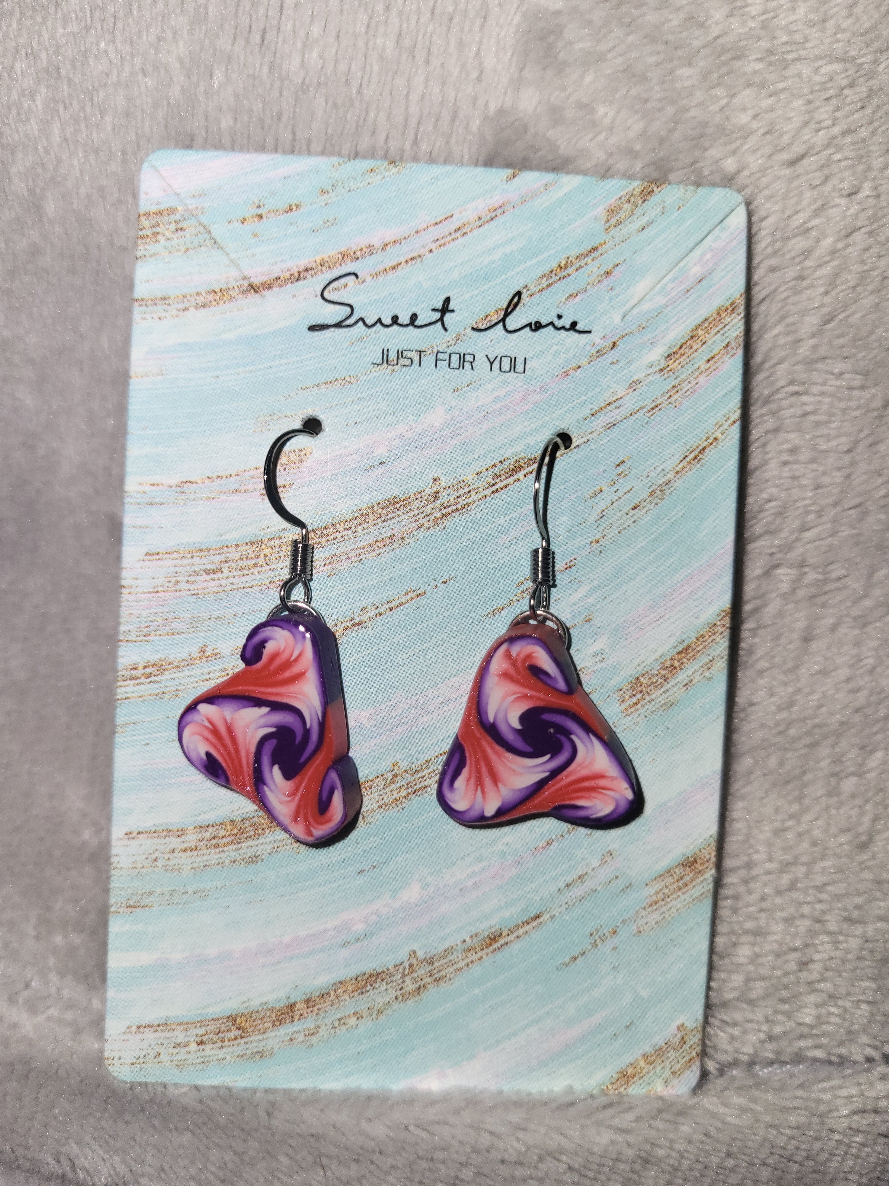 Homemade clay cane earrings
