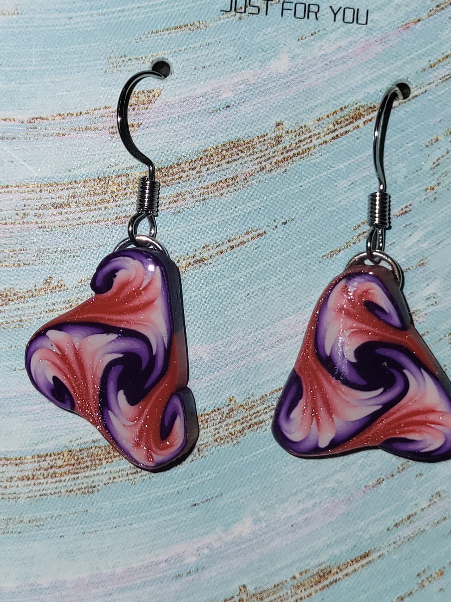 Homemade clay cane earrings