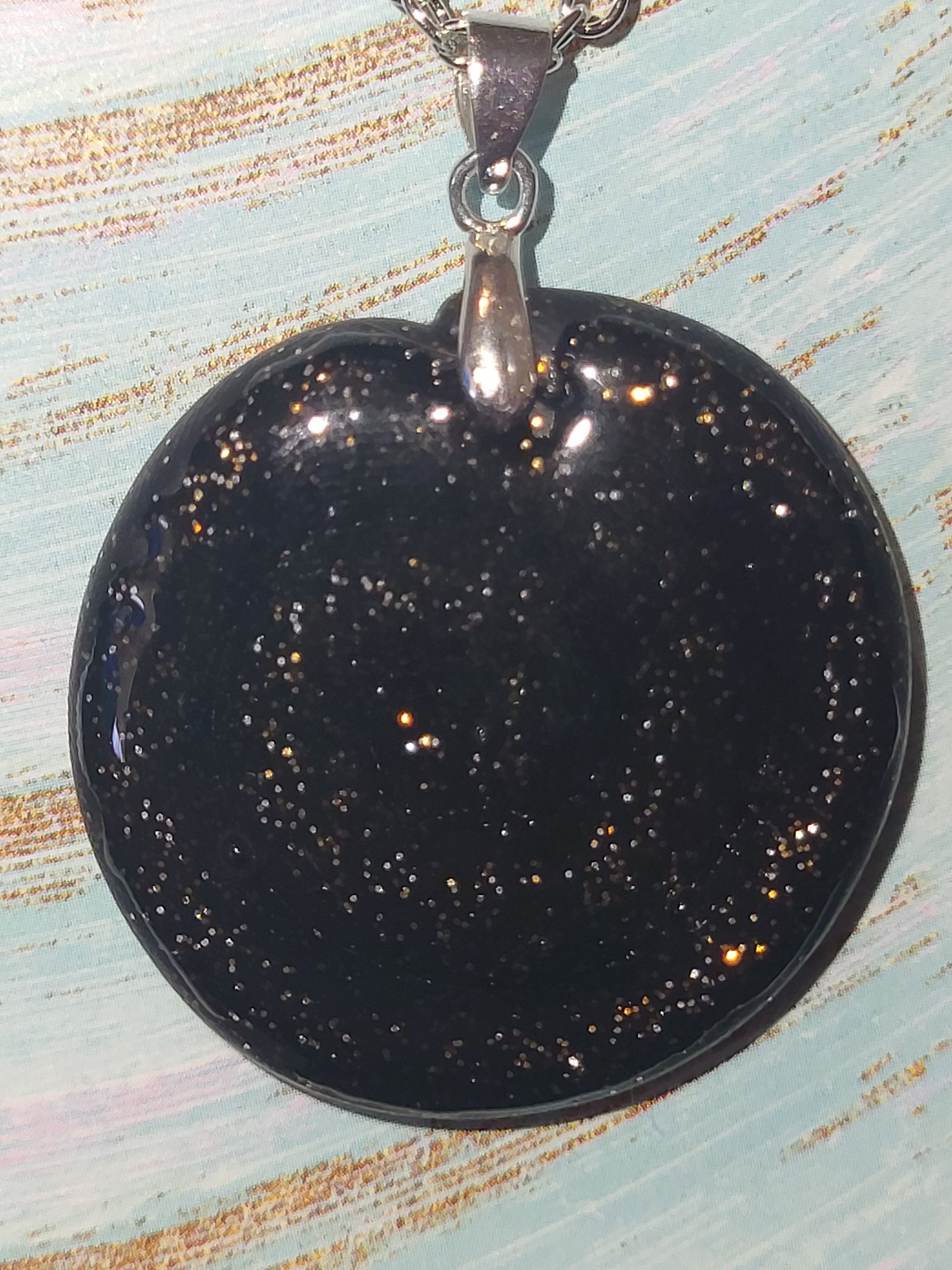 Homemade swirl charm