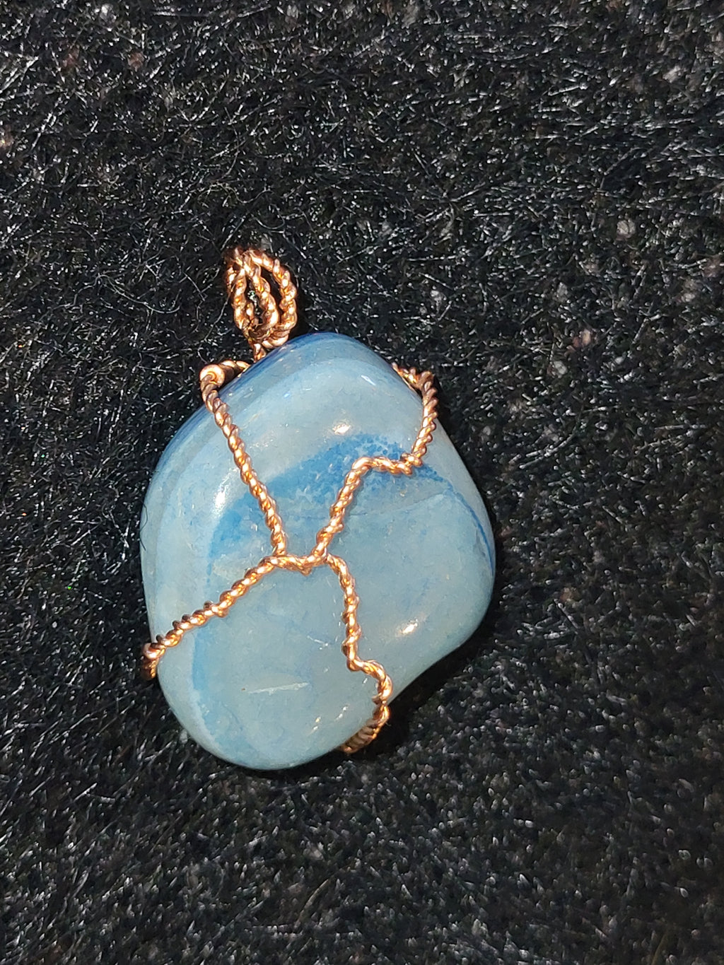 Handcrafted wire wrapped stone