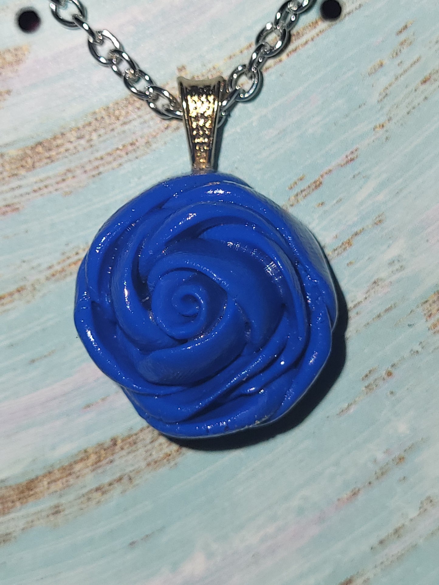 Handmade blue rose necklace