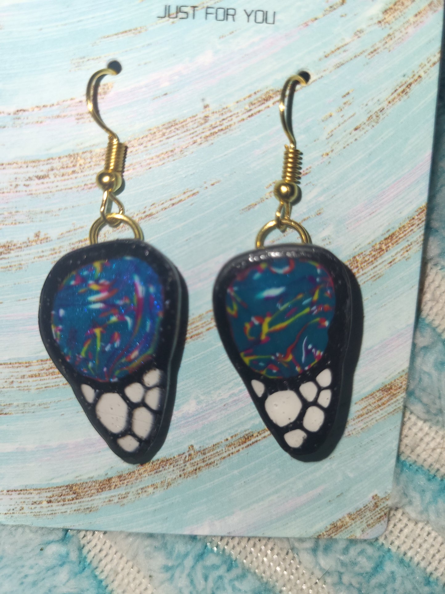 Homemade butterfly wing earrings