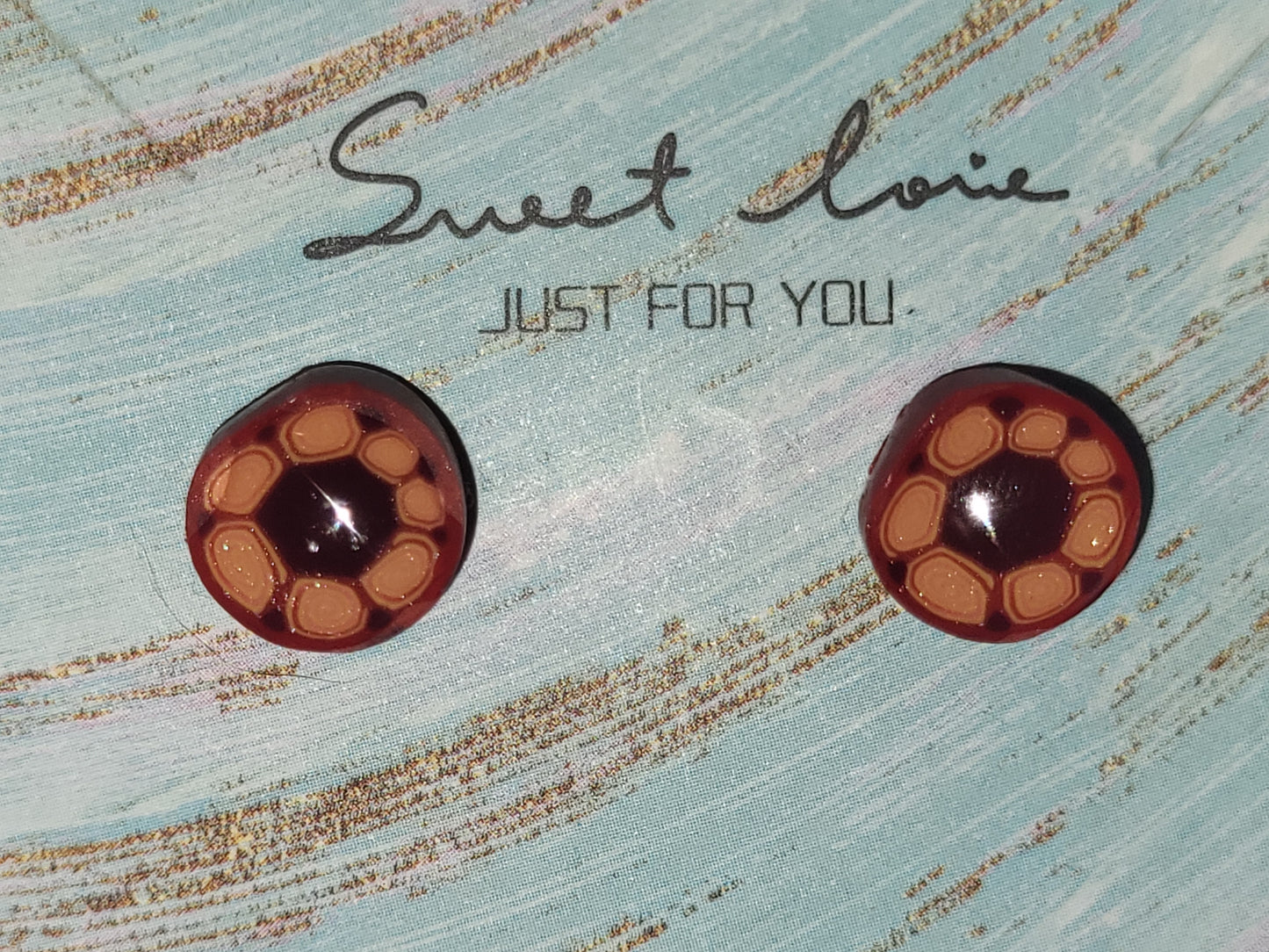 Homemade swirly flowers earrings