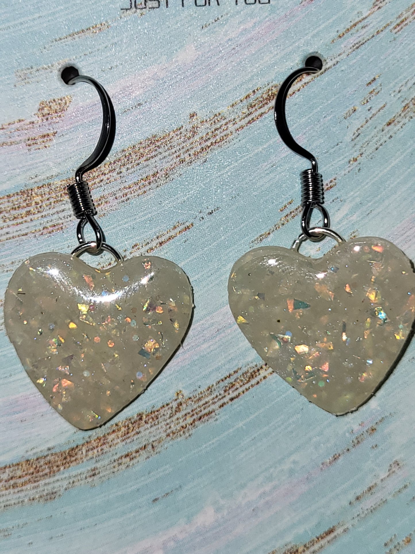 Homemade dangling heart earrings