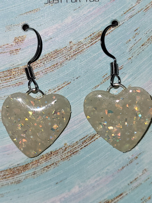 Homemade dangling heart earrings