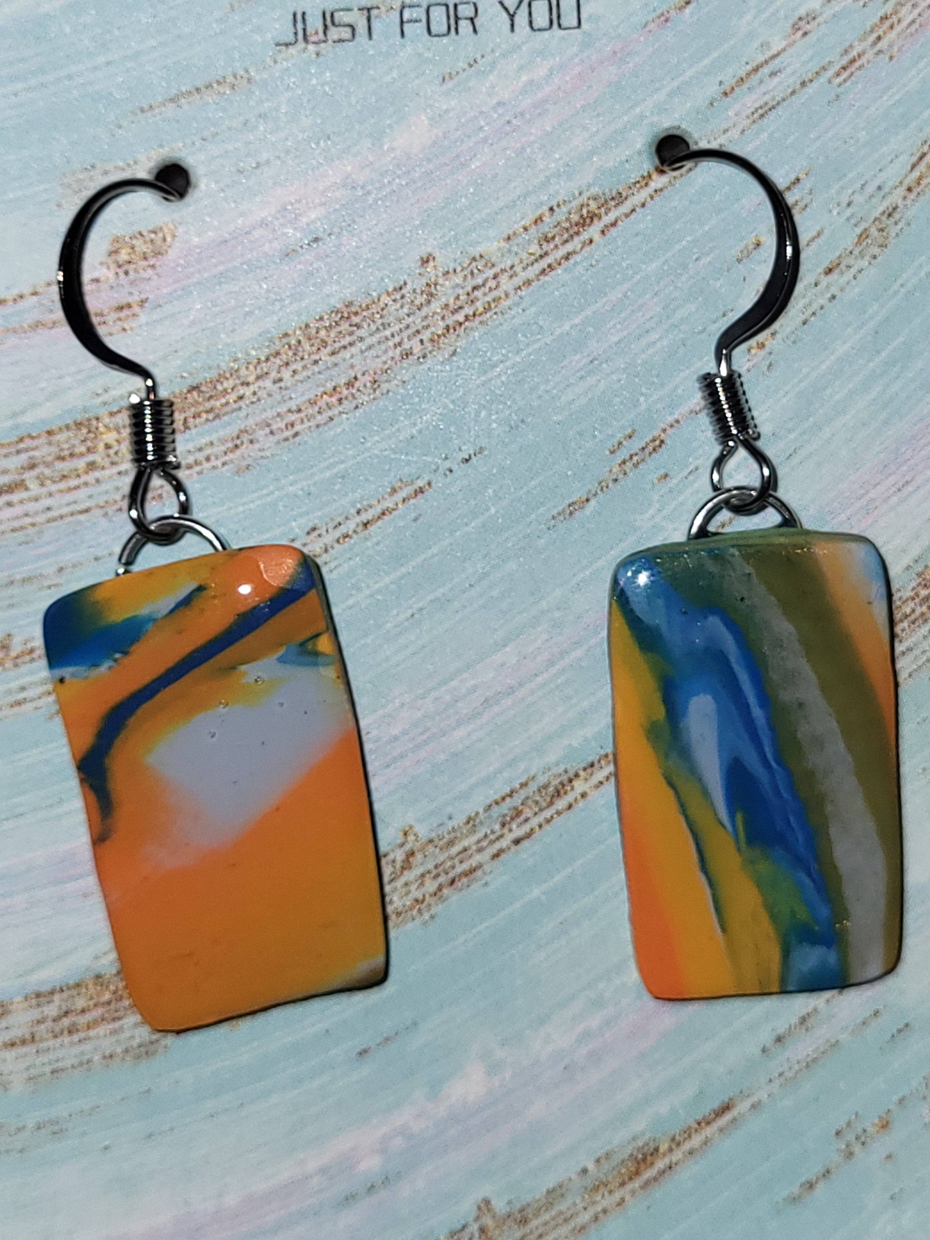 Bronco inspired marbled dangling earrings