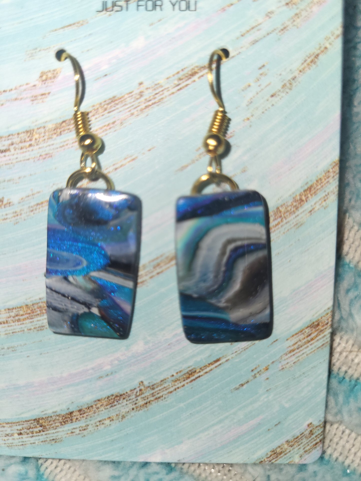 Homemade blue marble earrings