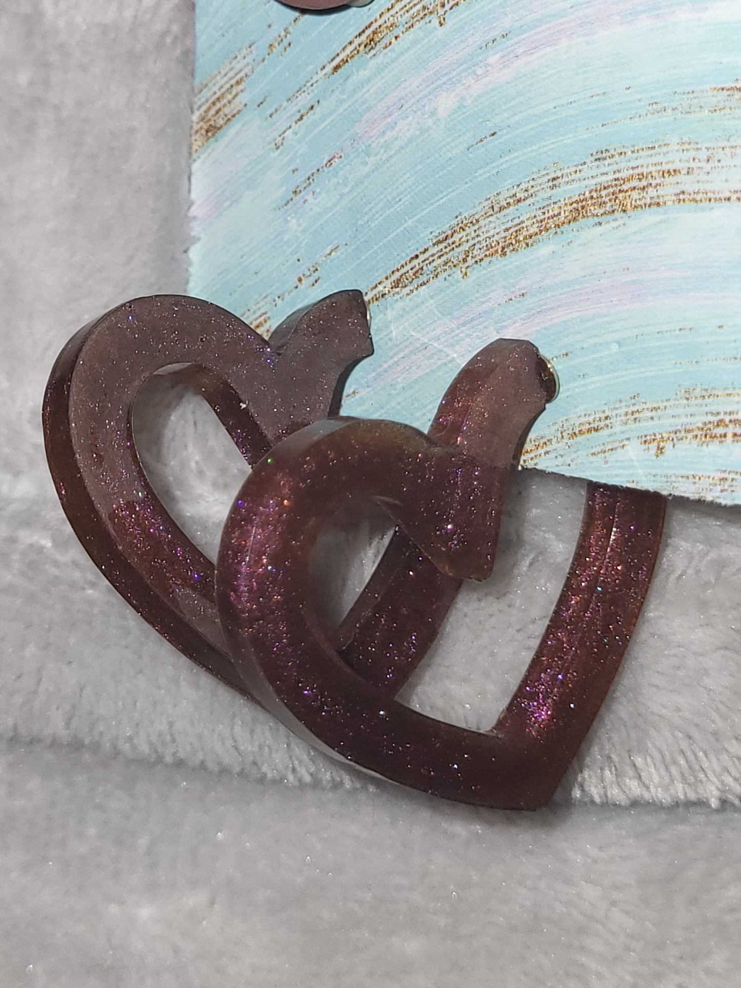 Homemade redish/purpleish heart shaped earrings