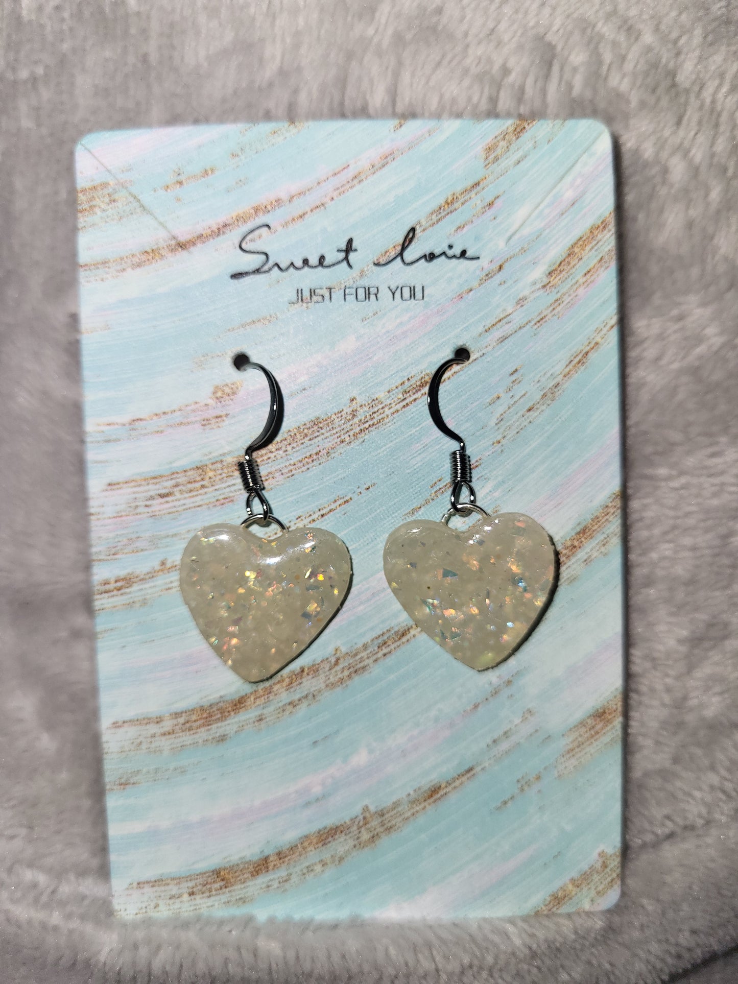 Homemade dangling heart earrings