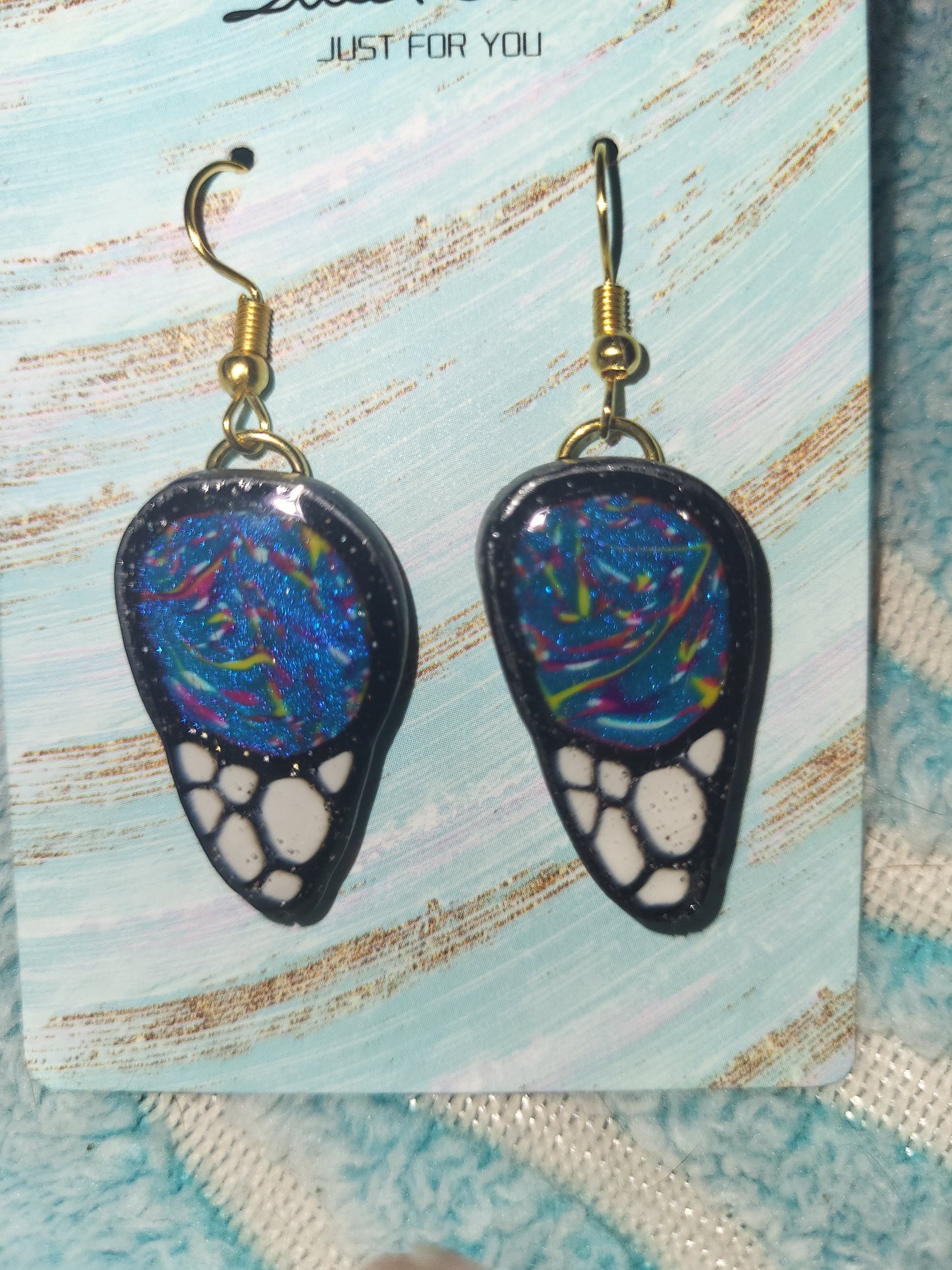 Homemade butterfly wing earrings