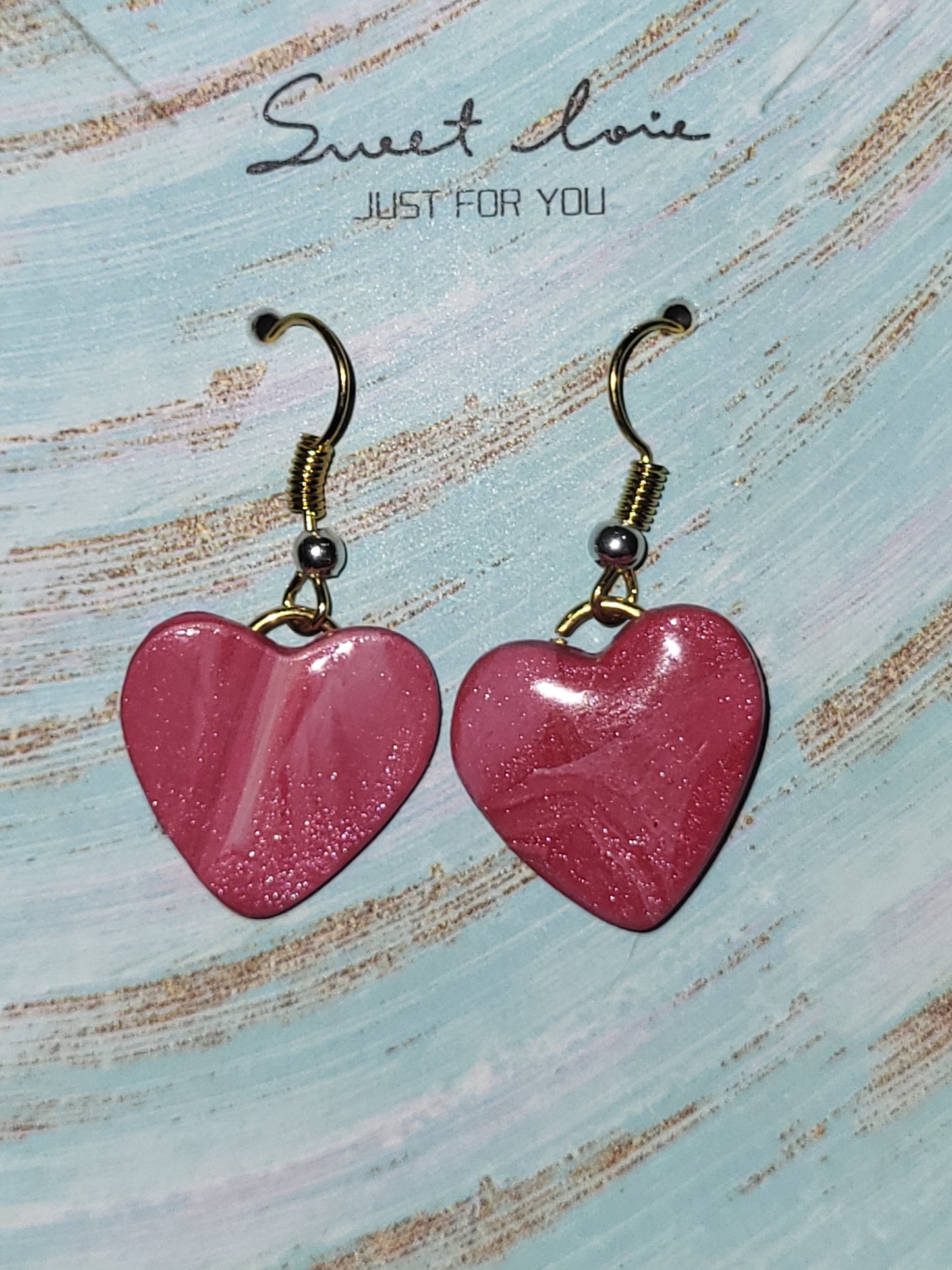 Homemade red/pink/white marbled dangling earrings