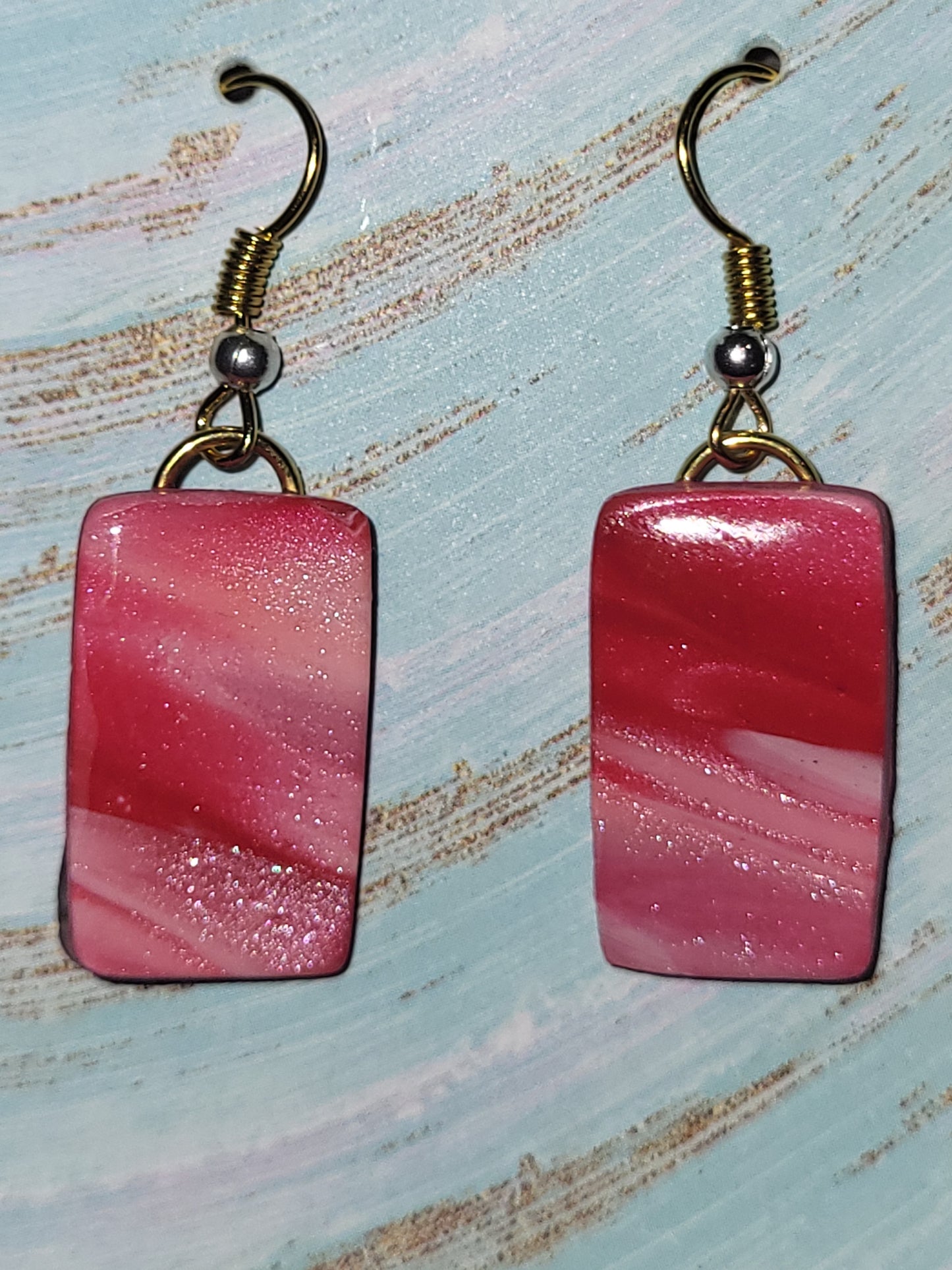 Homemade red/pink/white marbled dangling earrings