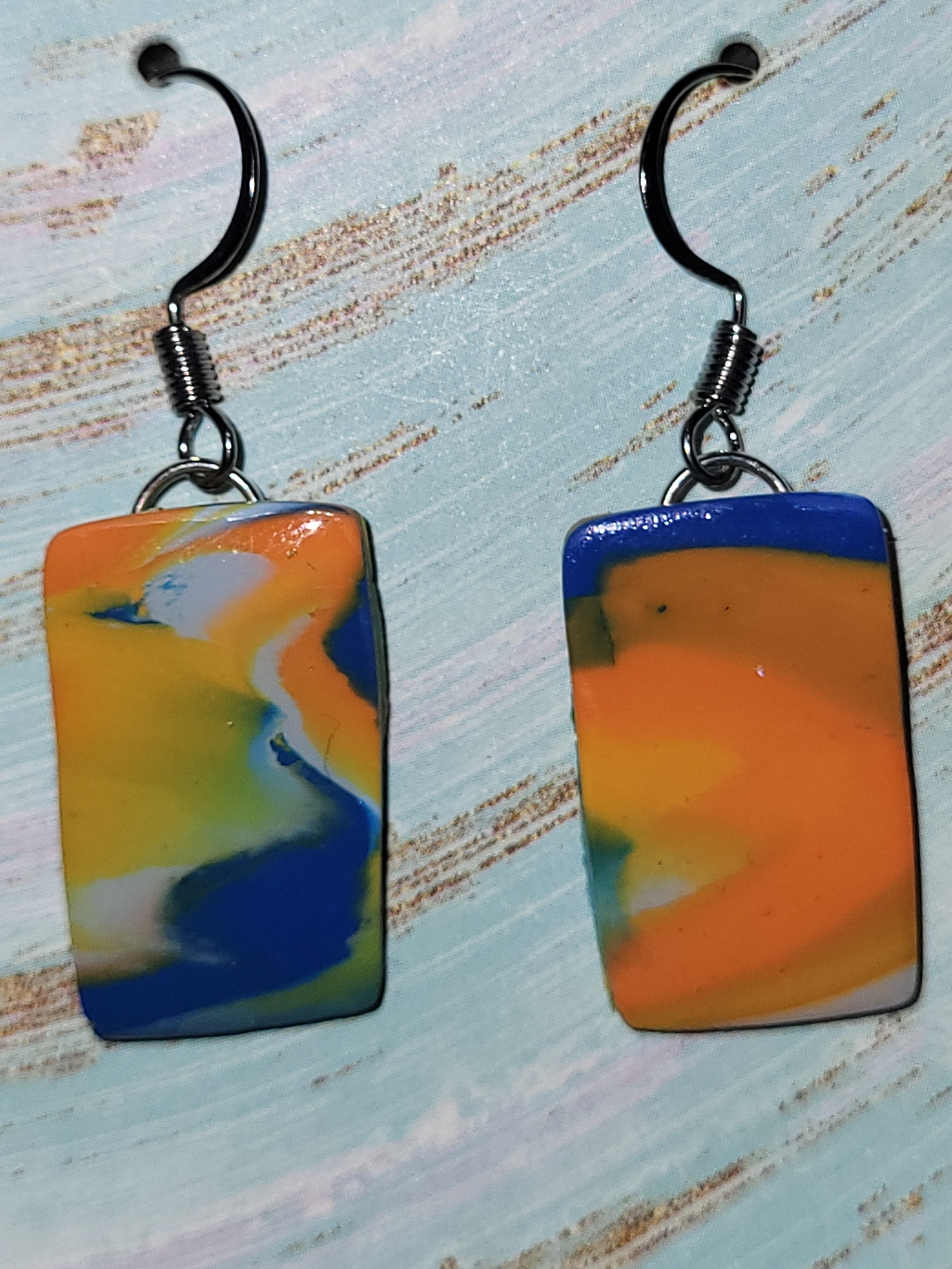 Bronco inspired marbled dangling earrings