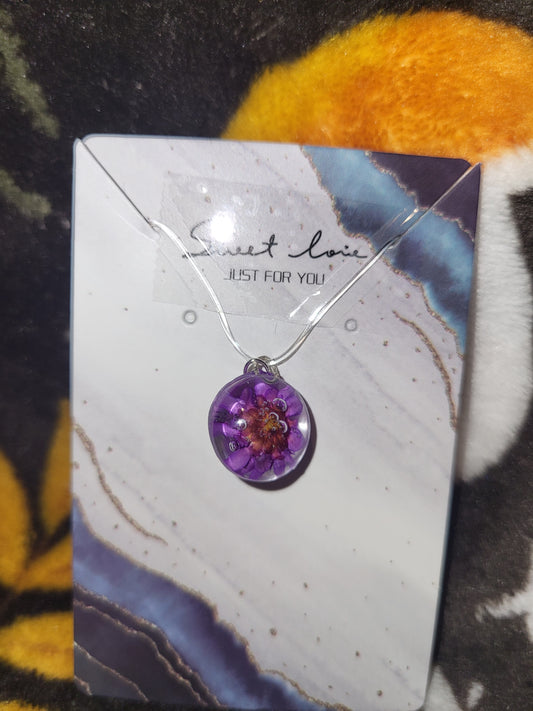 Dried flower in resin charm