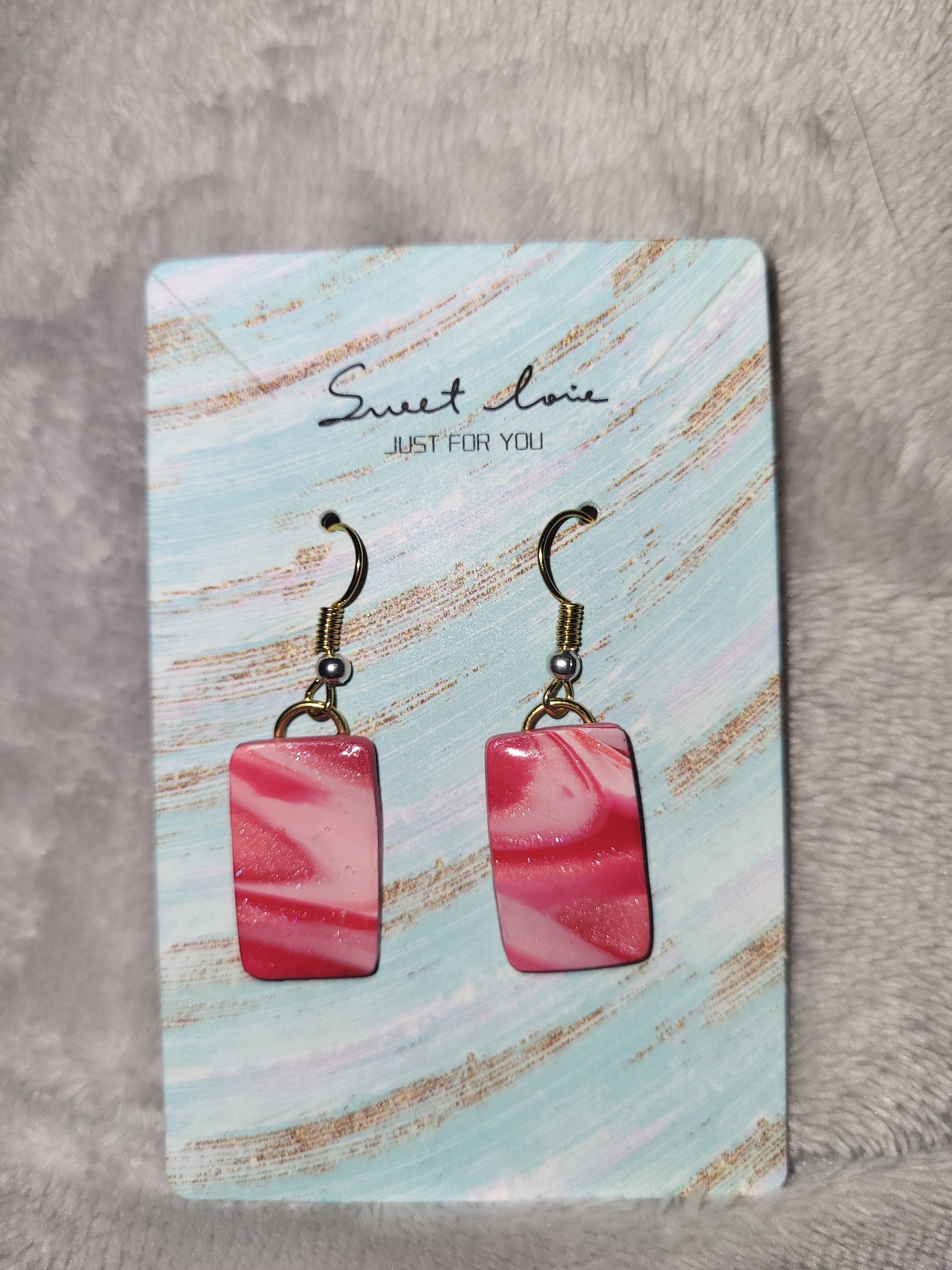 Homemade red/pink/white marbled dangling earrings