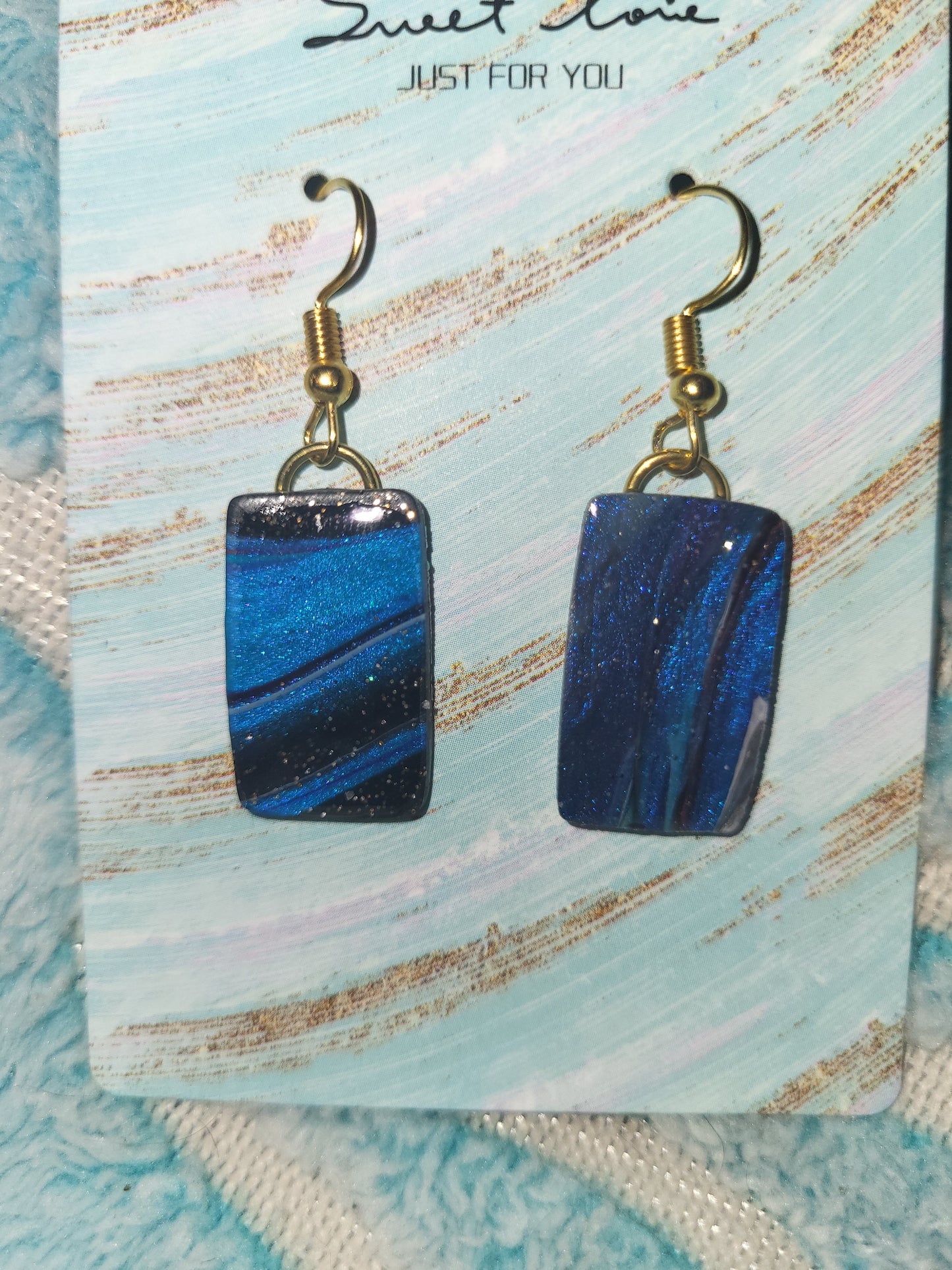 Homemade blue marble earrings