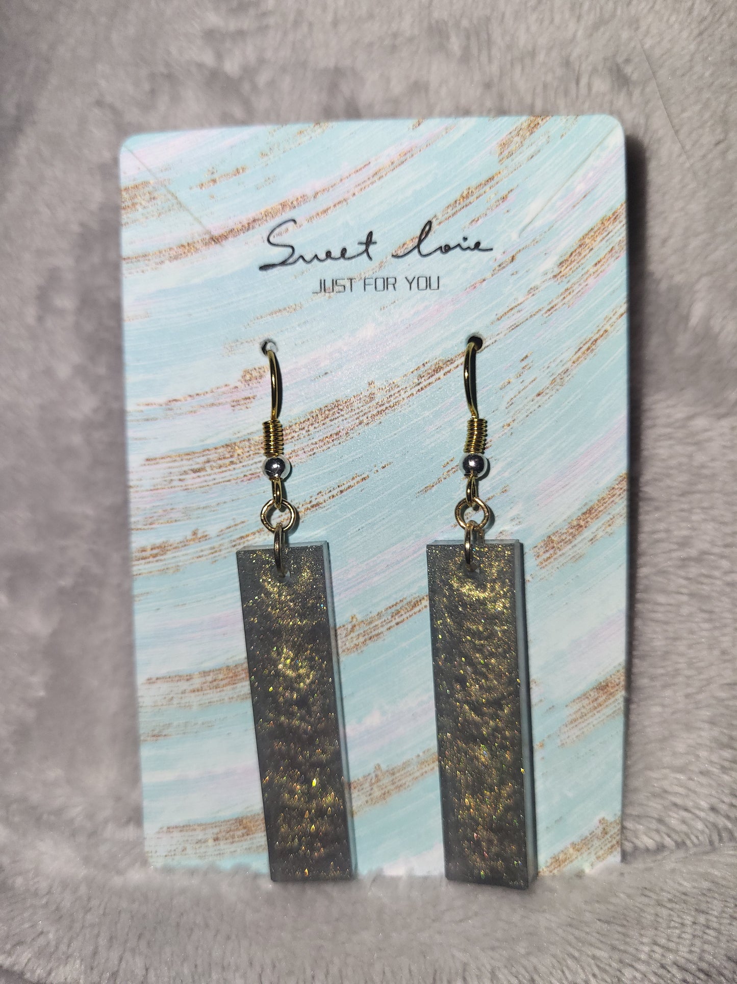 Homemade green dangling earrings