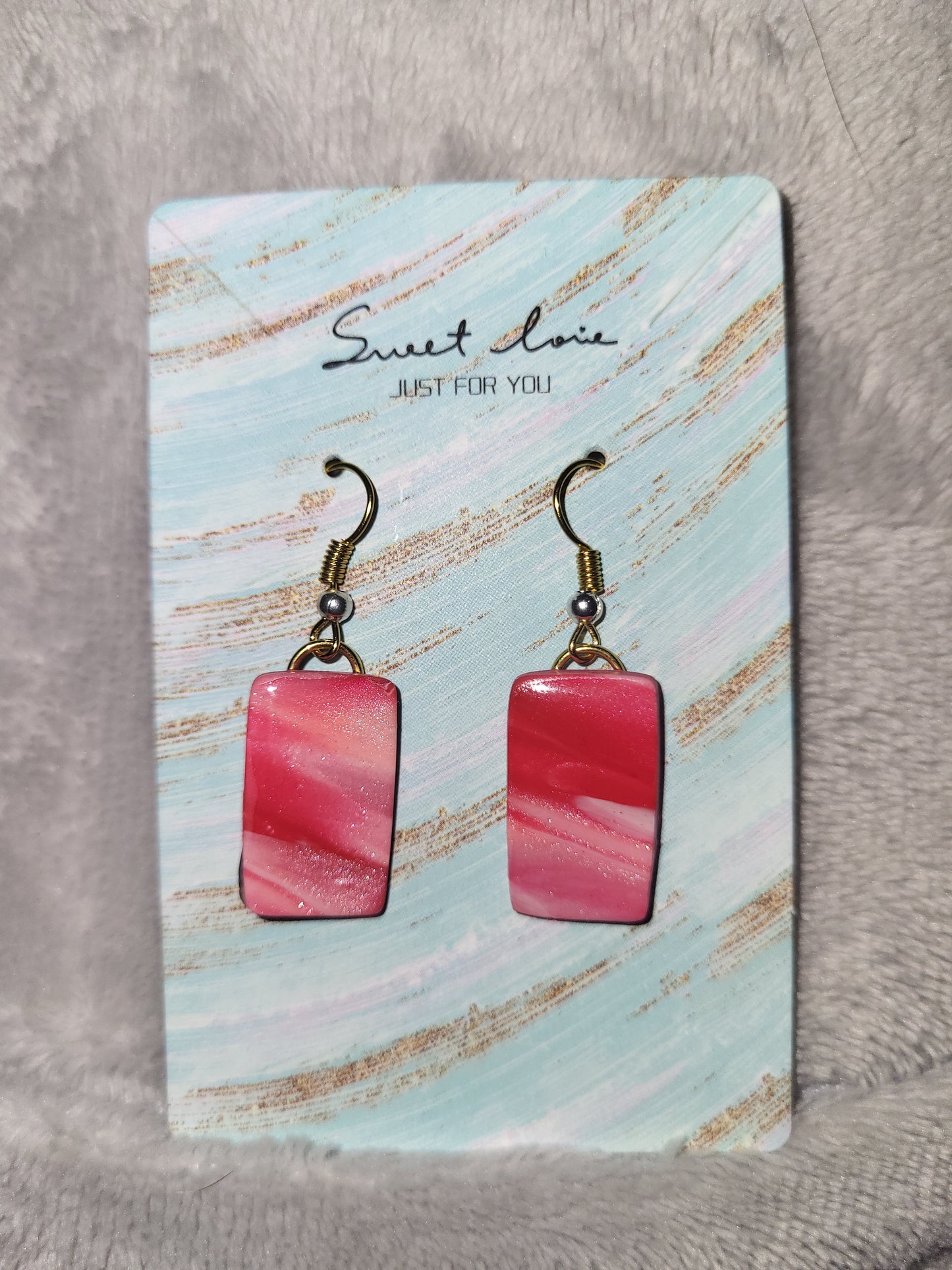 Homemade red/pink/white marbled dangling earrings