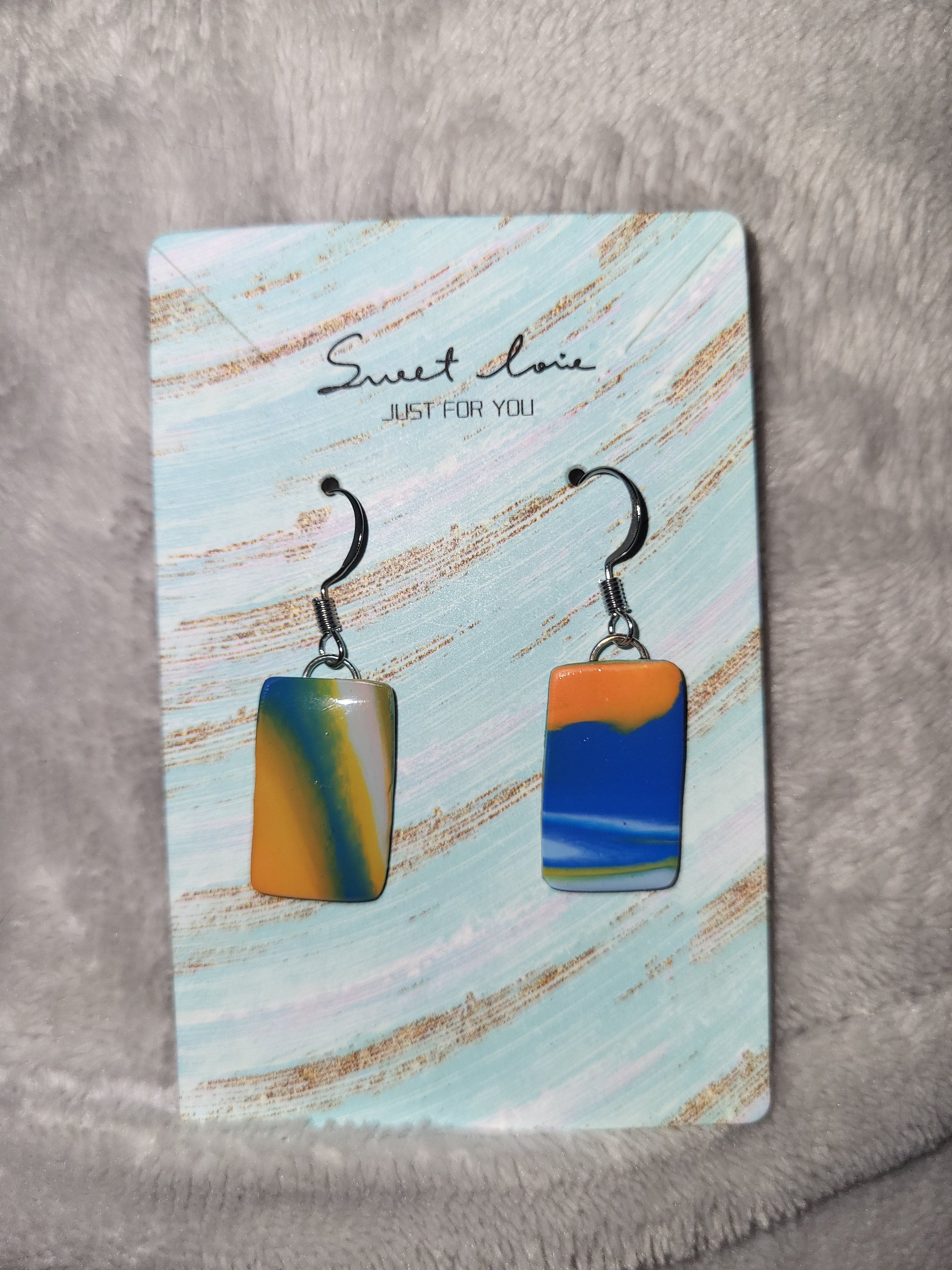 Bronco inspired marbled dangling earrings