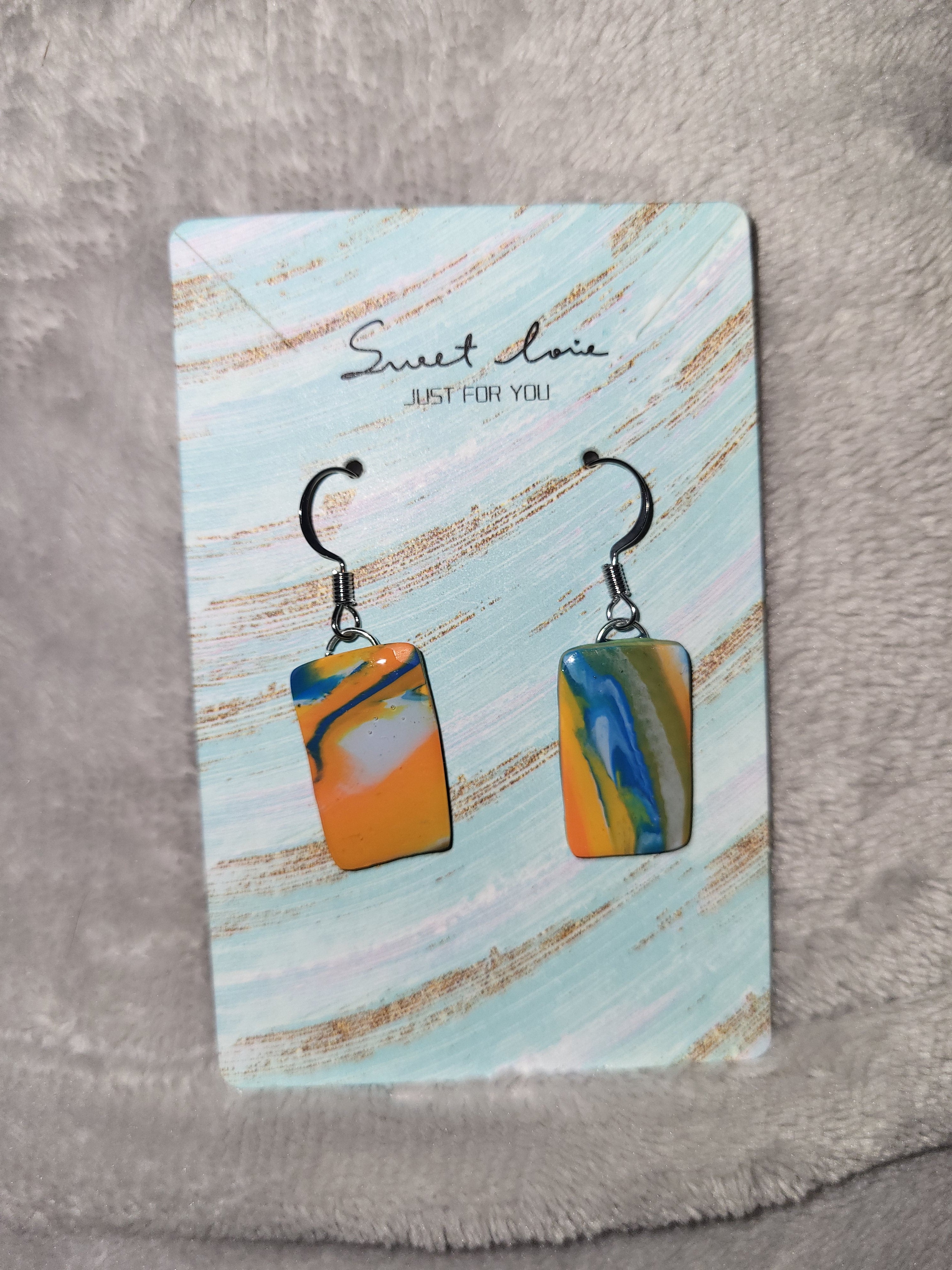 Bronco inspired marbled dangling earrings