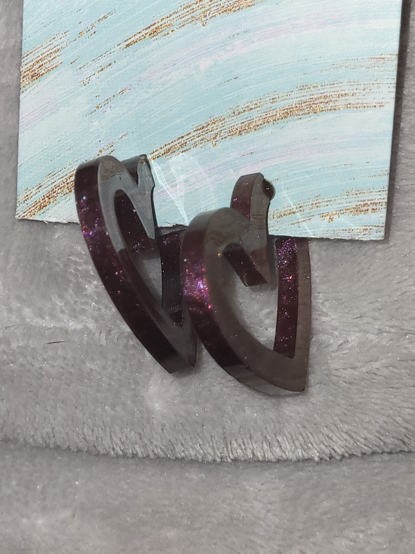 Homemade redish/purpleish heart shaped earrings