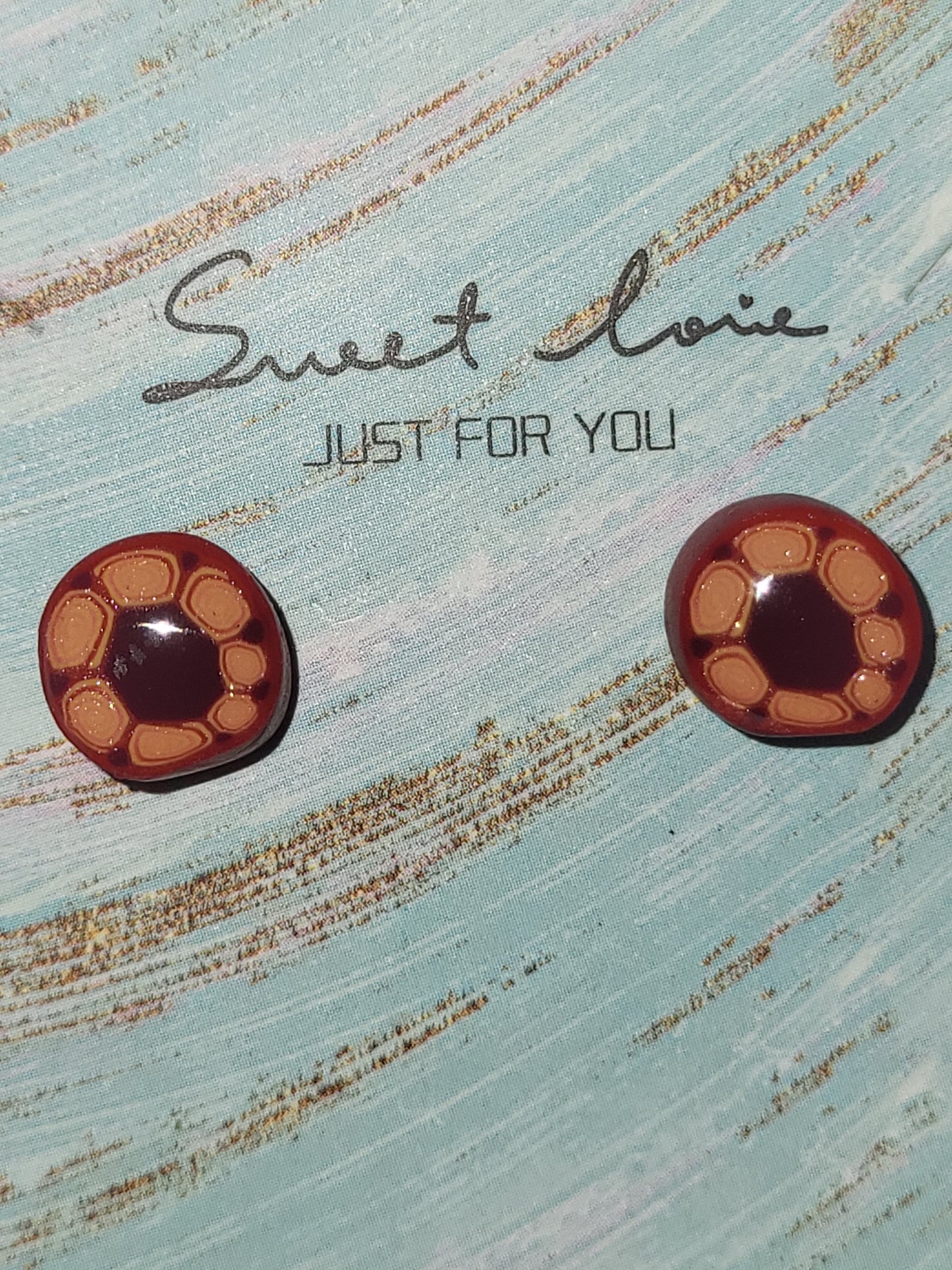 Homemade swirly flowers earrings