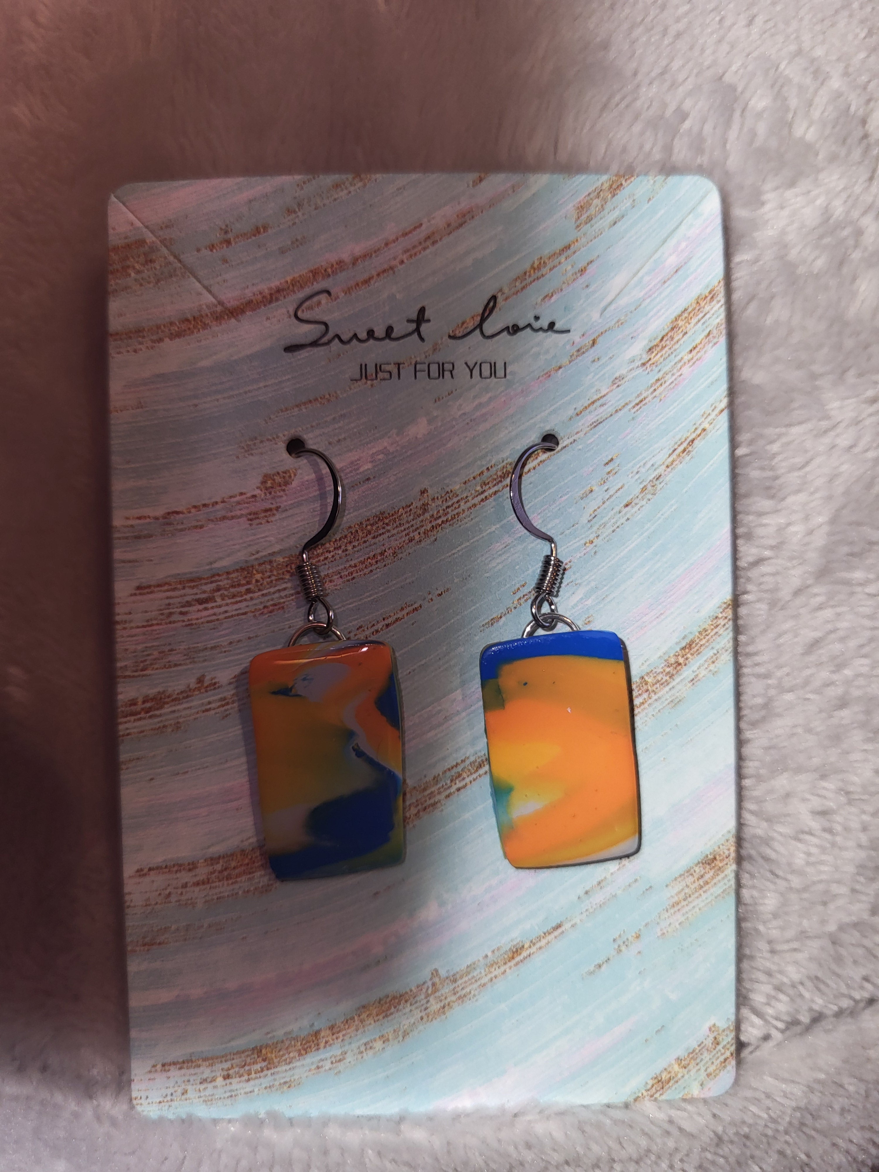 Bronco inspired marbled dangling earrings