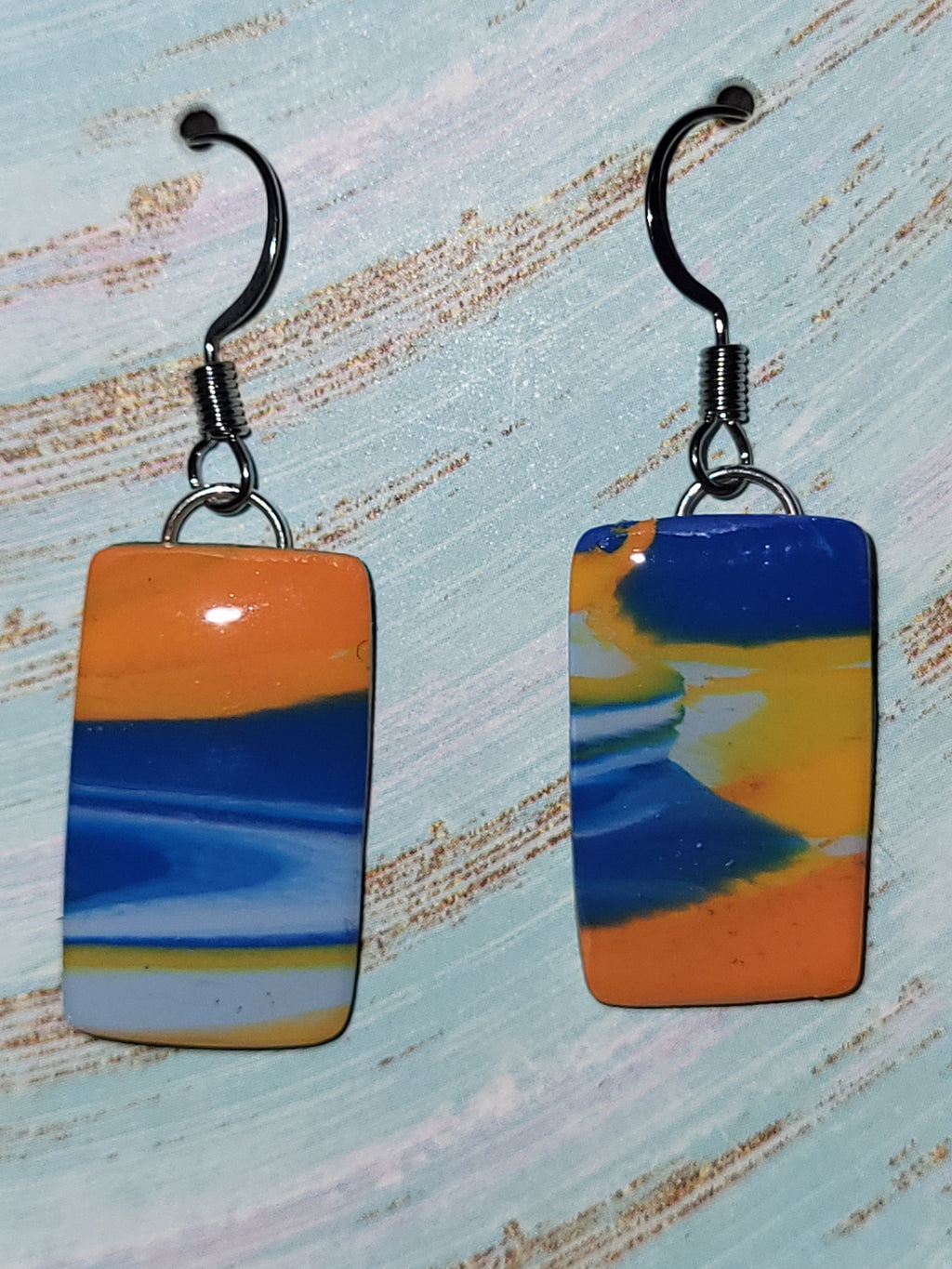 Bronco inspired marbled dangling earrings