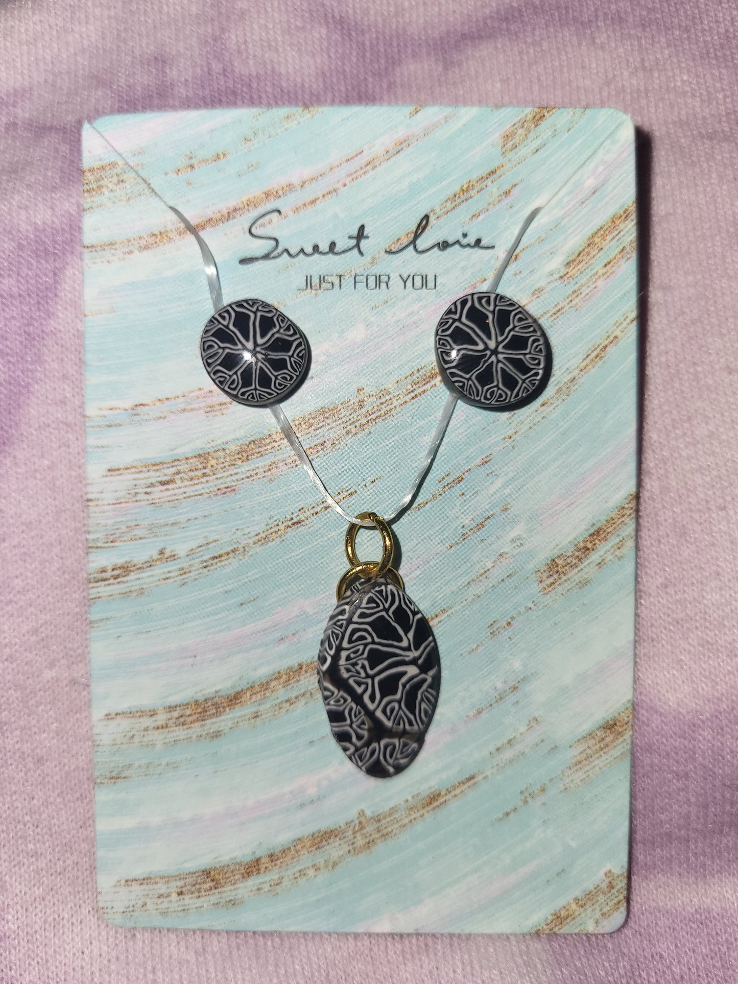 Homemade stud earrings & charm set