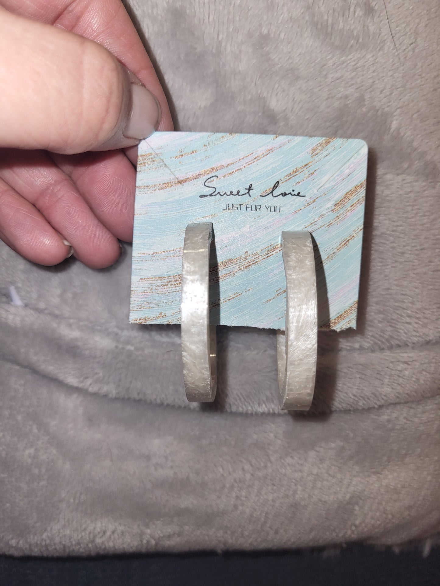 Homemade white shimmery earrings