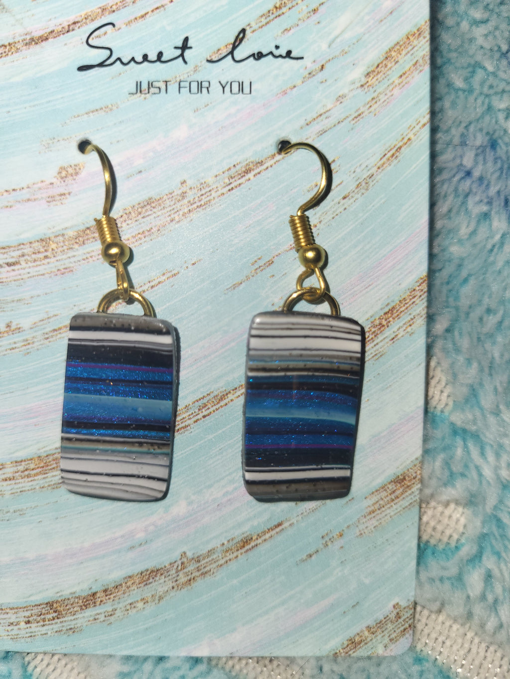 Homemade blue marble earrings