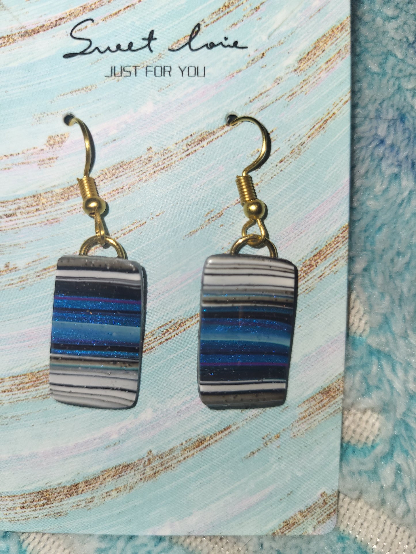 Homemade blue marble earrings