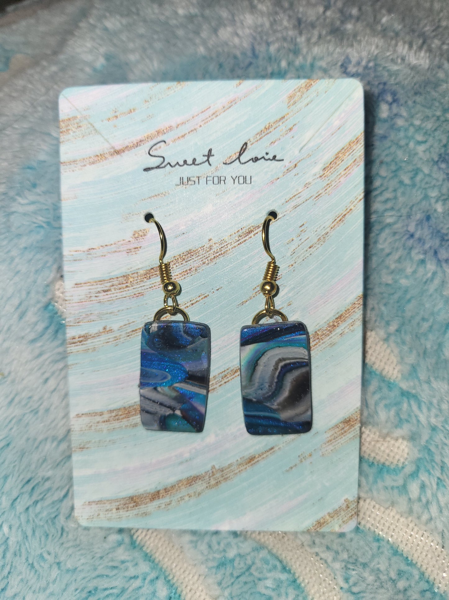 Homemade blue marble earrings