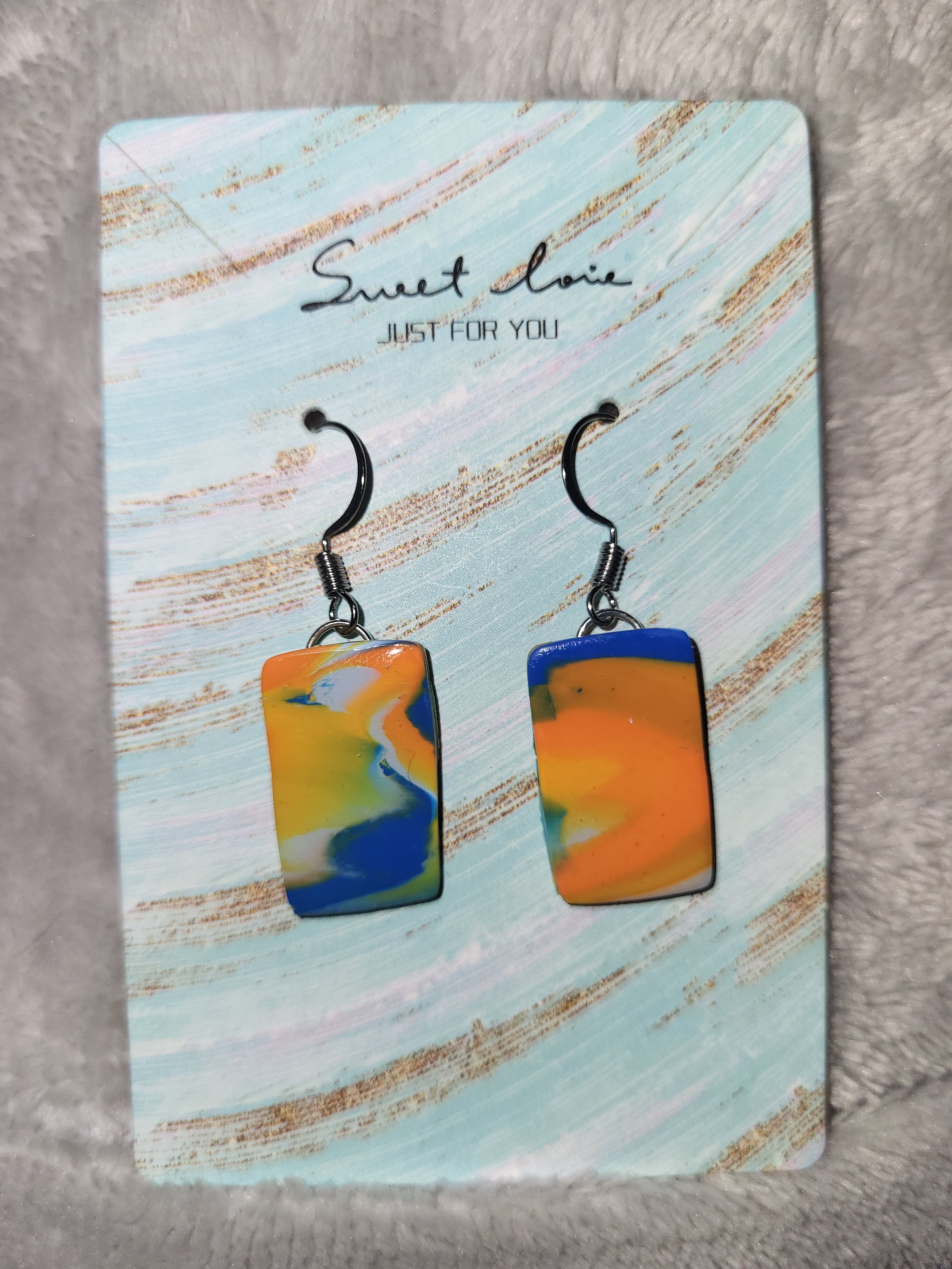 Bronco inspired marbled dangling earrings