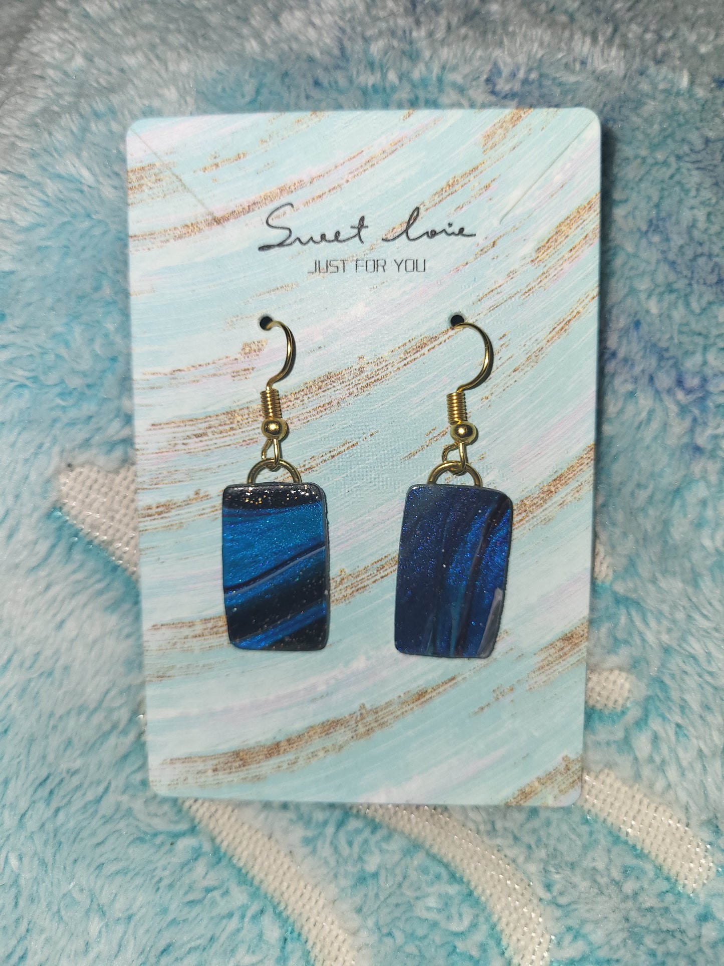 Homemade blue marble earrings