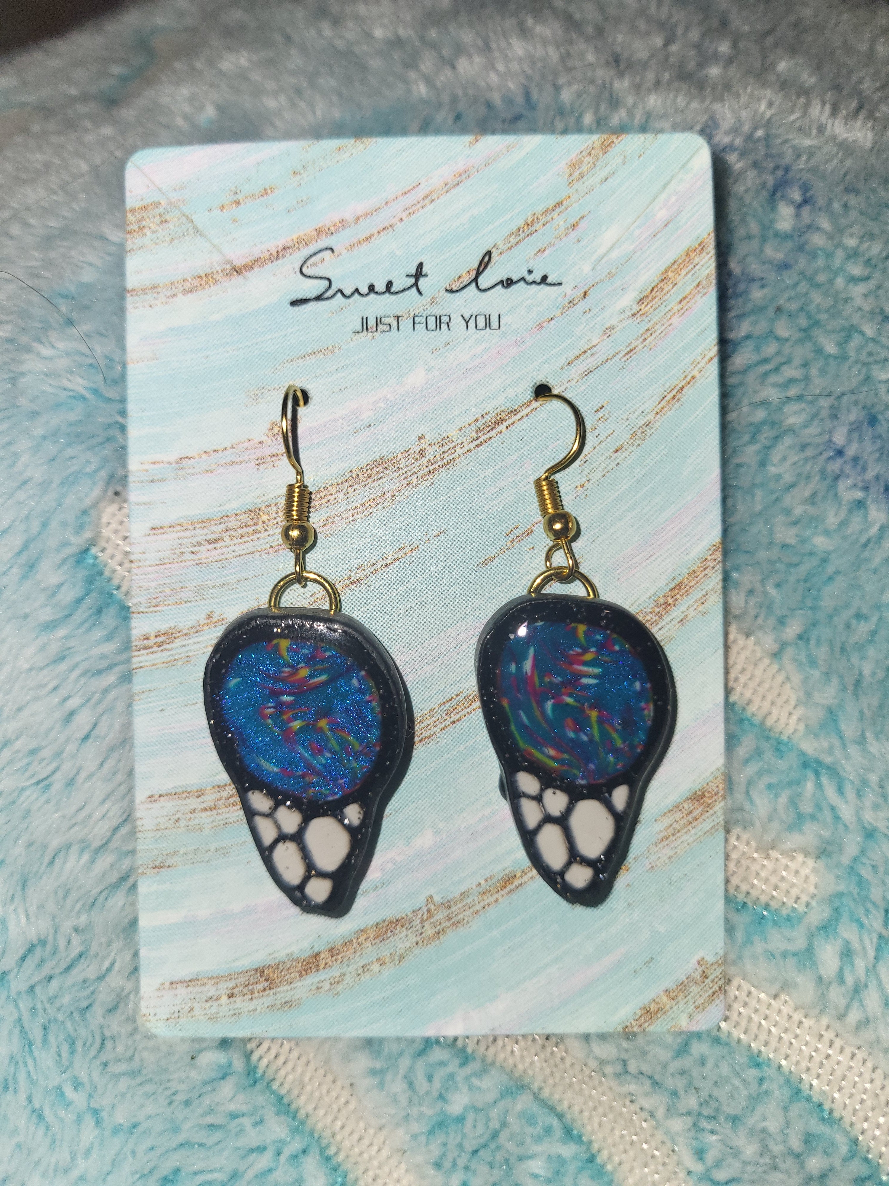 Homemade butterfly wing earrings