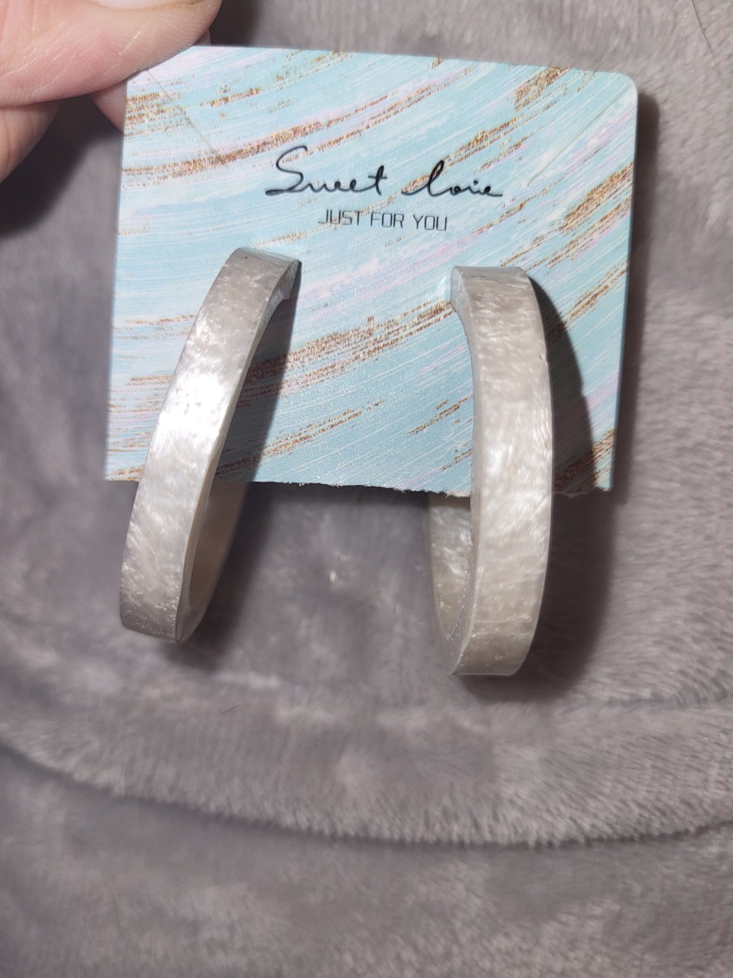 Homemade white shimmery earrings