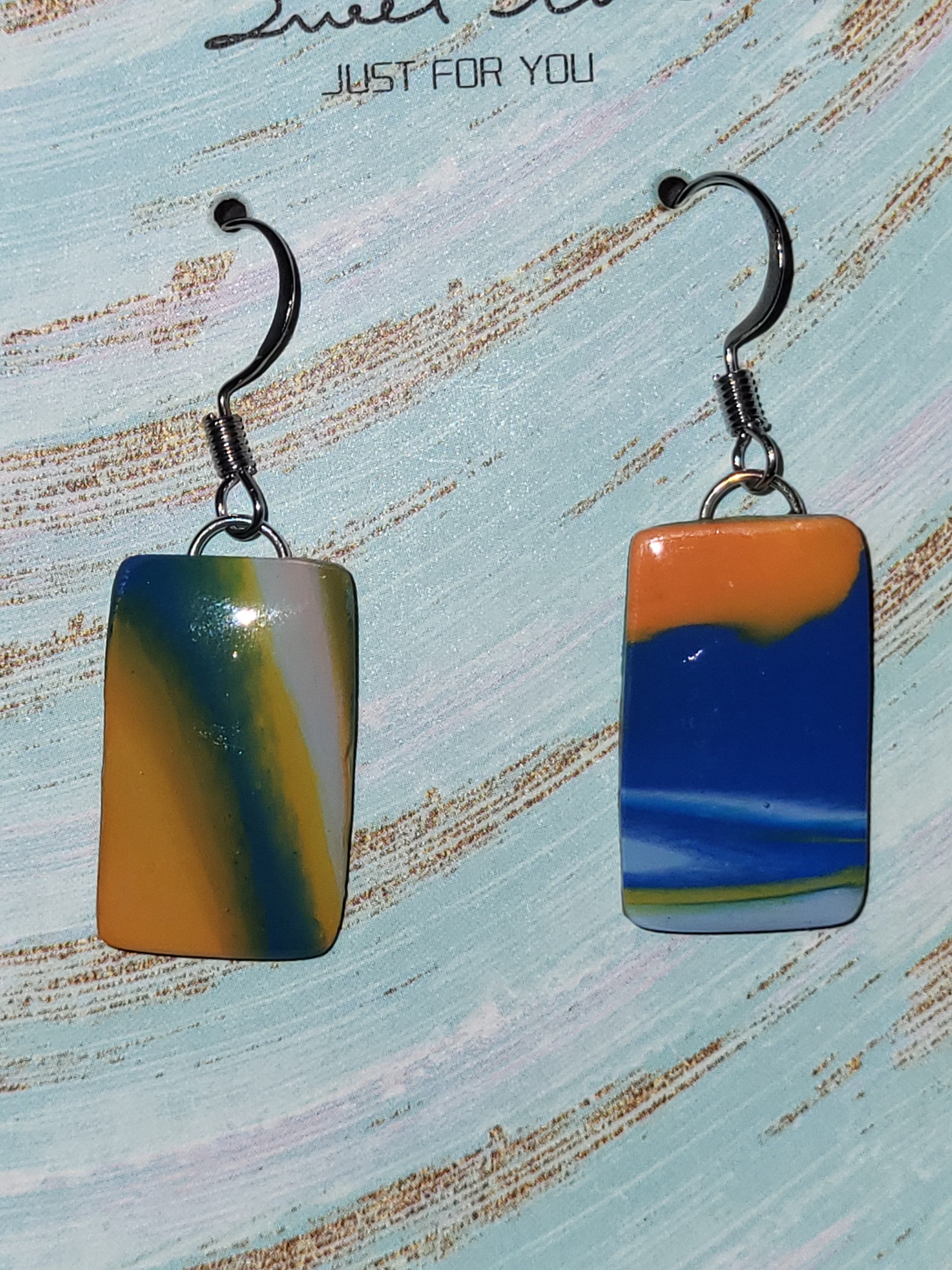 Bronco inspired marbled dangling earrings
