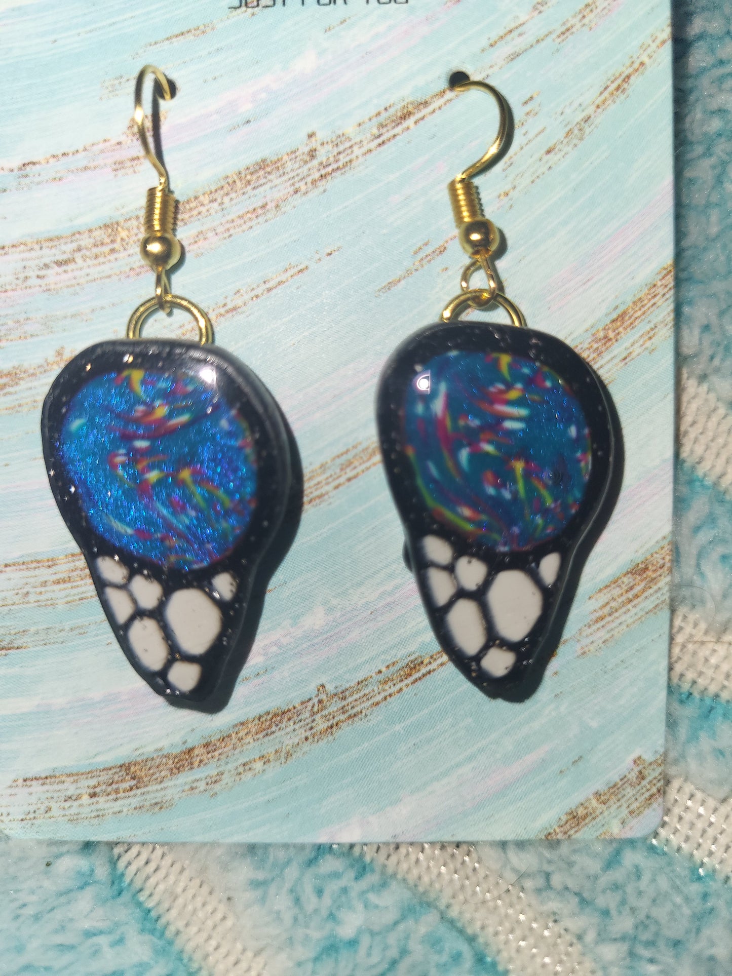 Homemade butterfly wing earrings